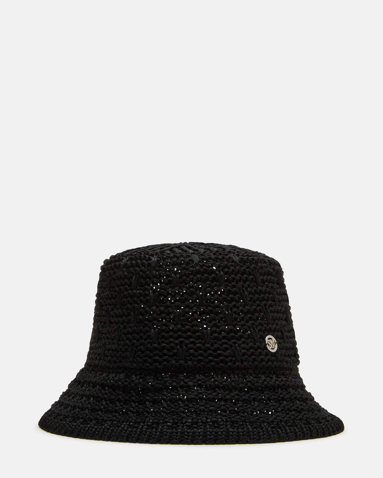 Person wearing the bucket hat at a sunny outdoor café
