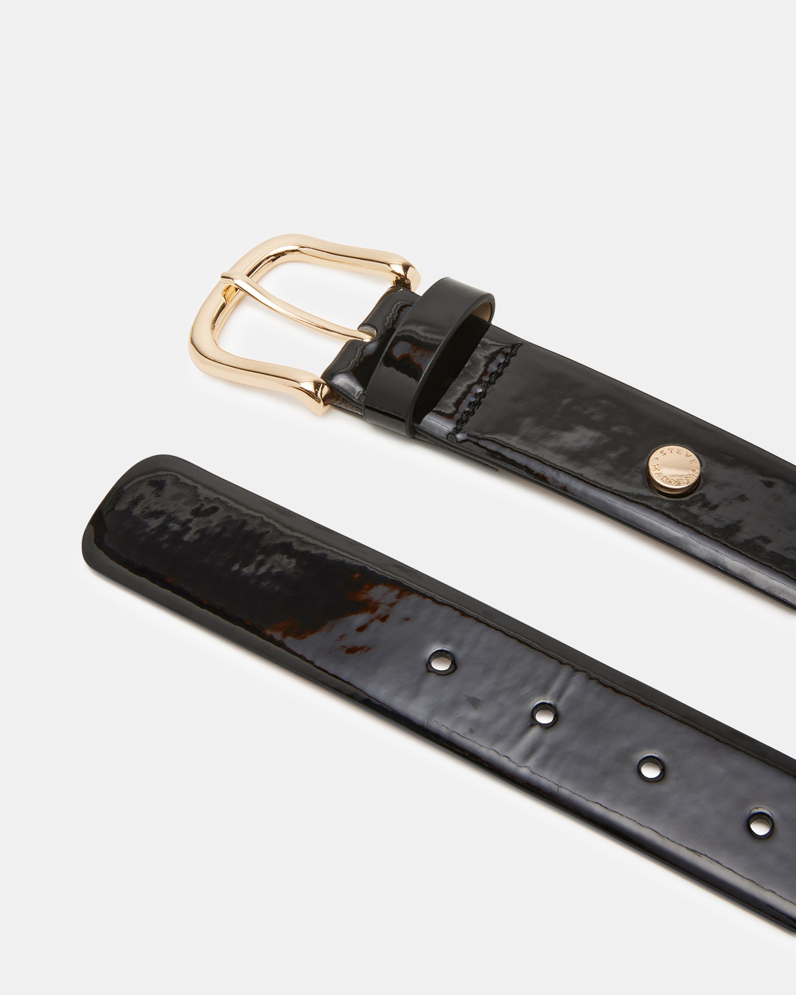 Belt styled with jeans and blazer, showing casual versatility in Dallas streetwear