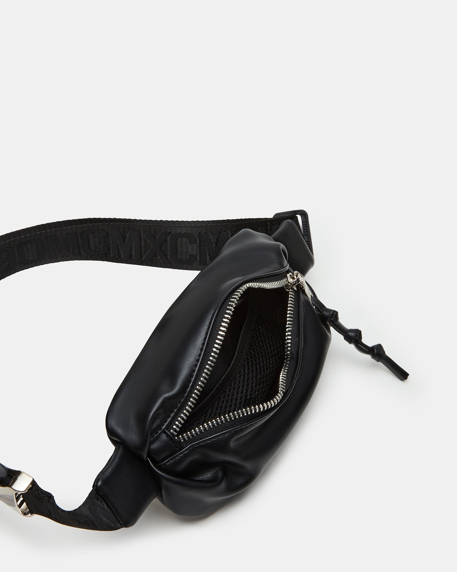 Close-up of pleated texture and zipper pocket on belt bag