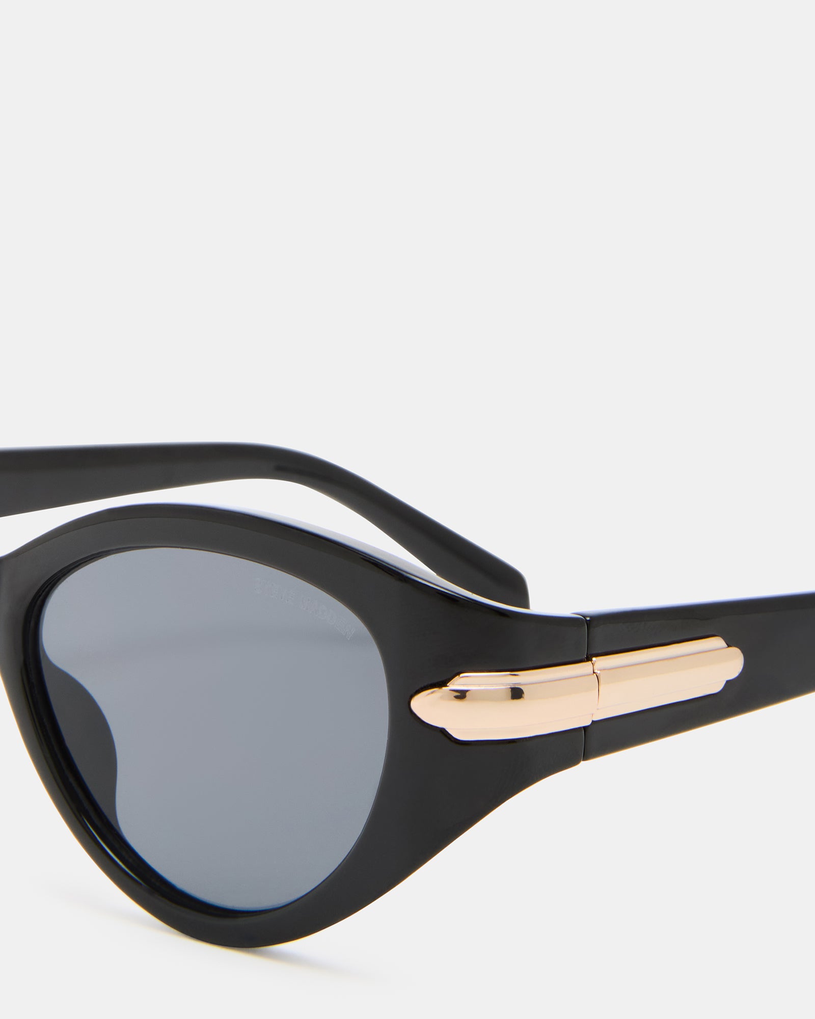 Side angle of black sunglasses showing elegant design.