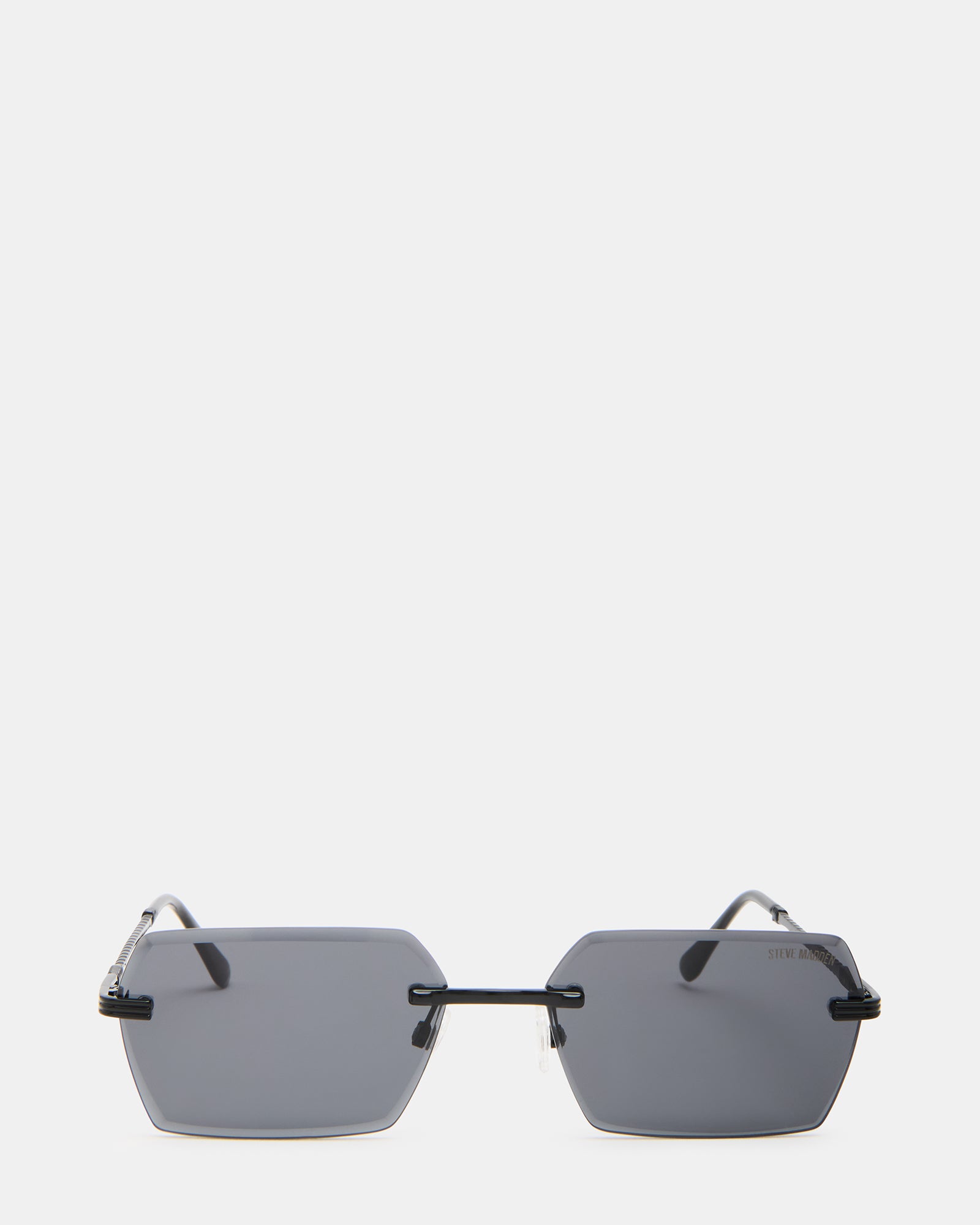 Finnian black sunglasses modeled on a woman outdoors