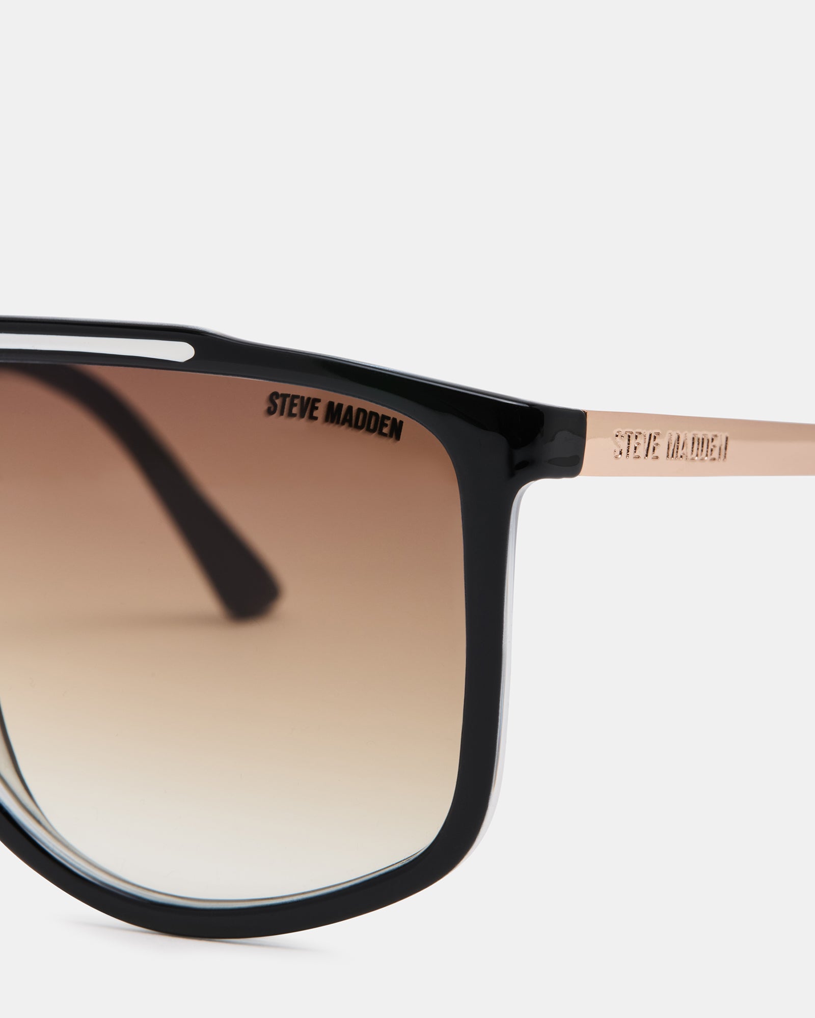 Side angle showcasing the black and white enamel square sunglasses on a model
