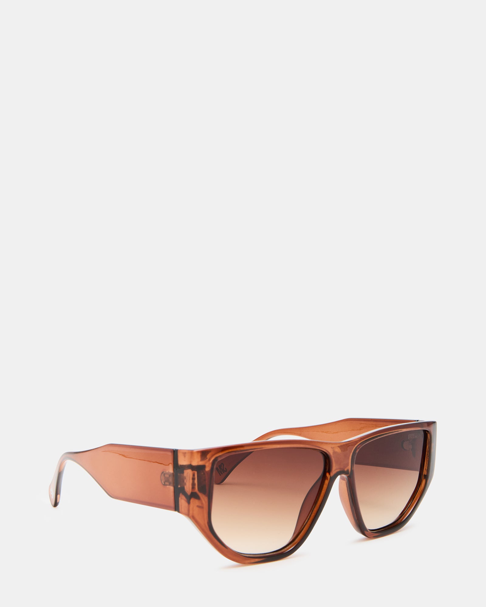 Close-up of the brown gradient lens sunglasses highlighting their sleek design.