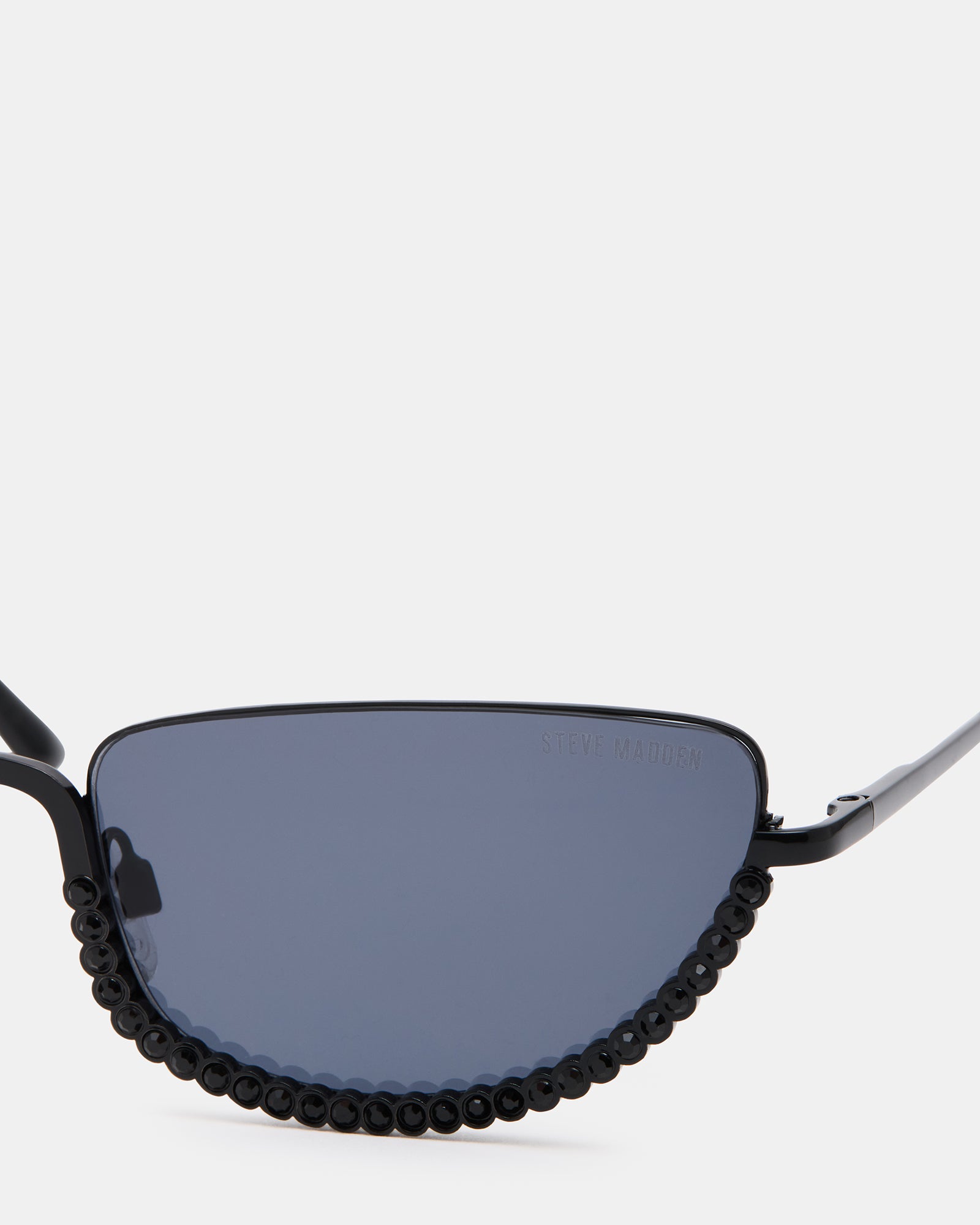 Side angle showing black stone detailing and sleek metal frame
