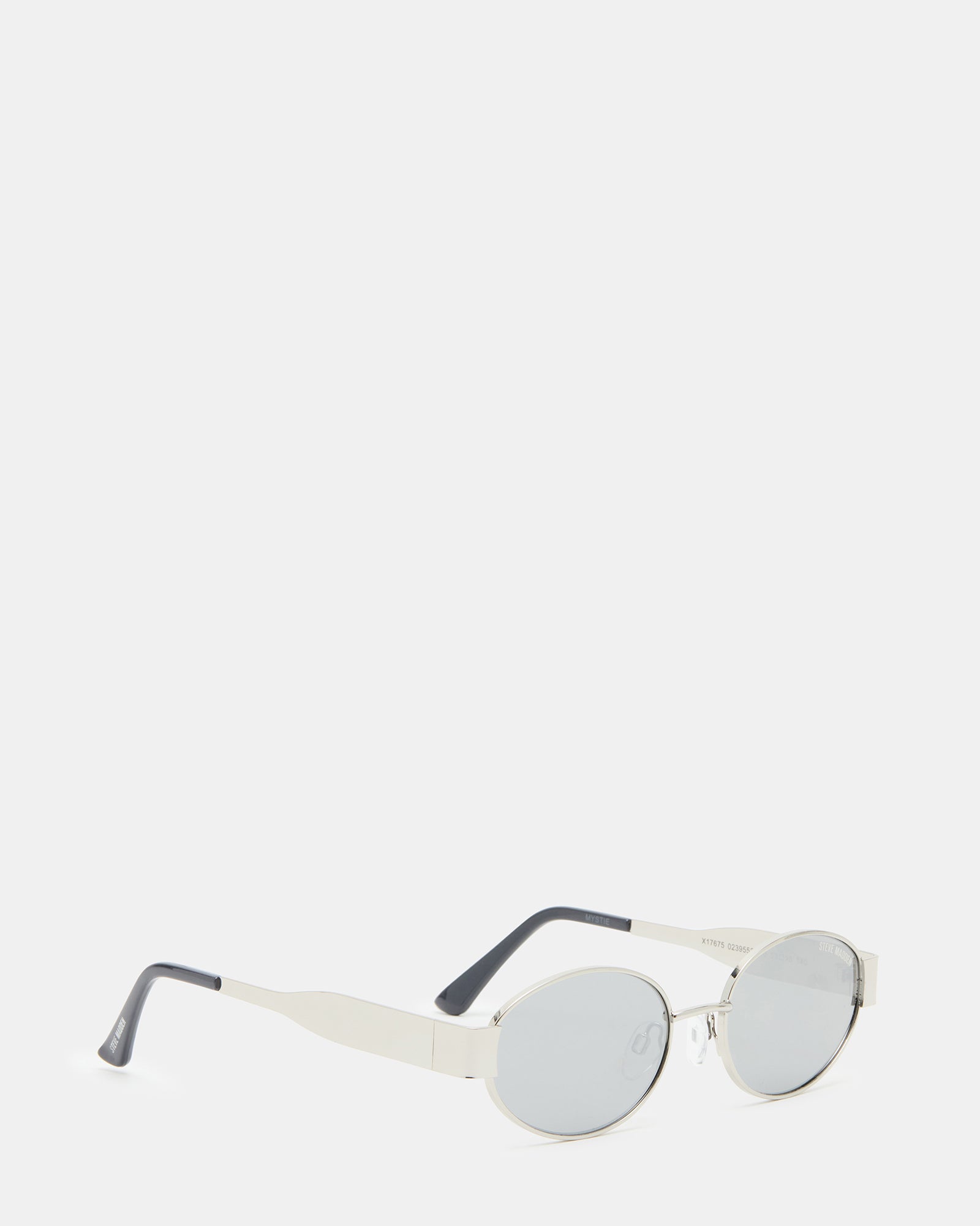 Person wearing silver sunglasses during a sunny day at the beach