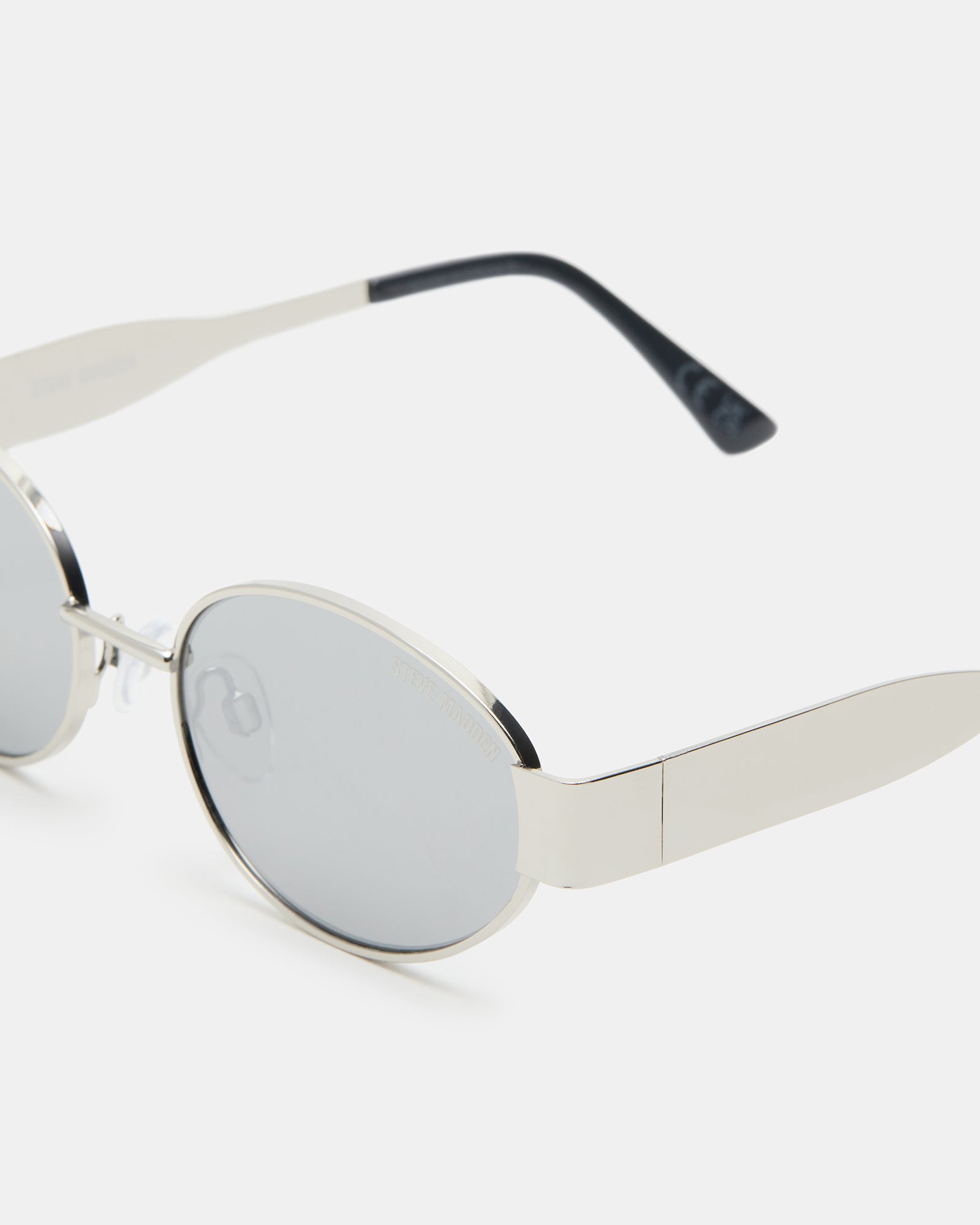 Front view of silver sunglasses showing the sleek metal design and UV lenses