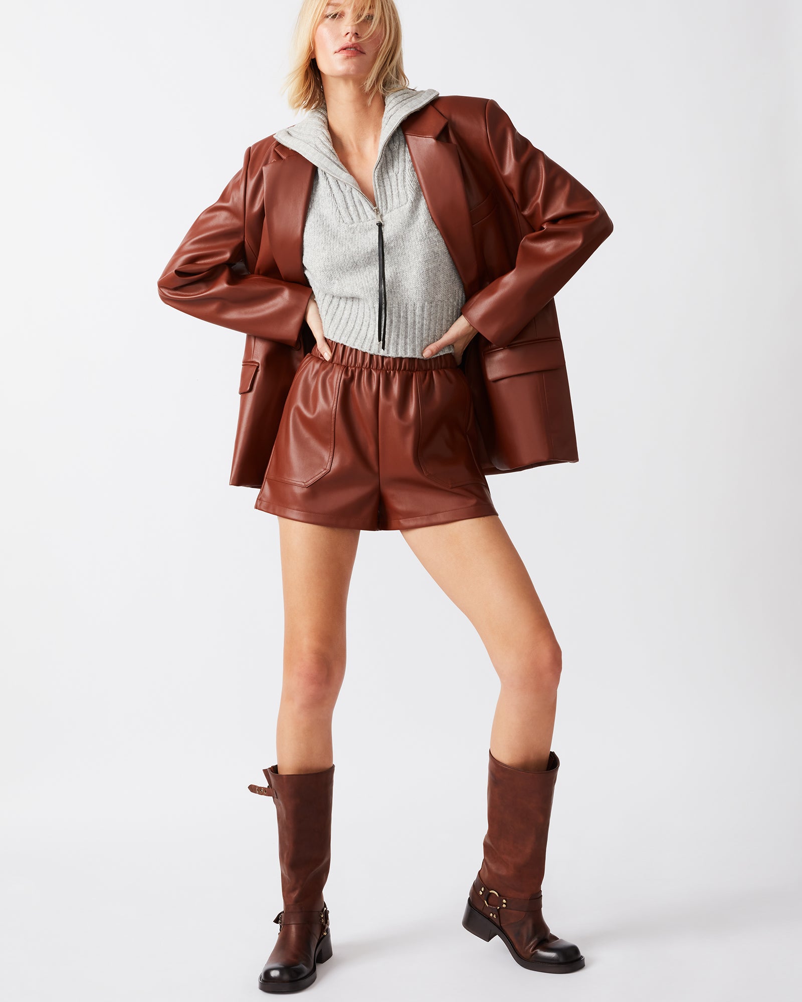 Styled outfit featuring faux leather shorts for women in a casual setting