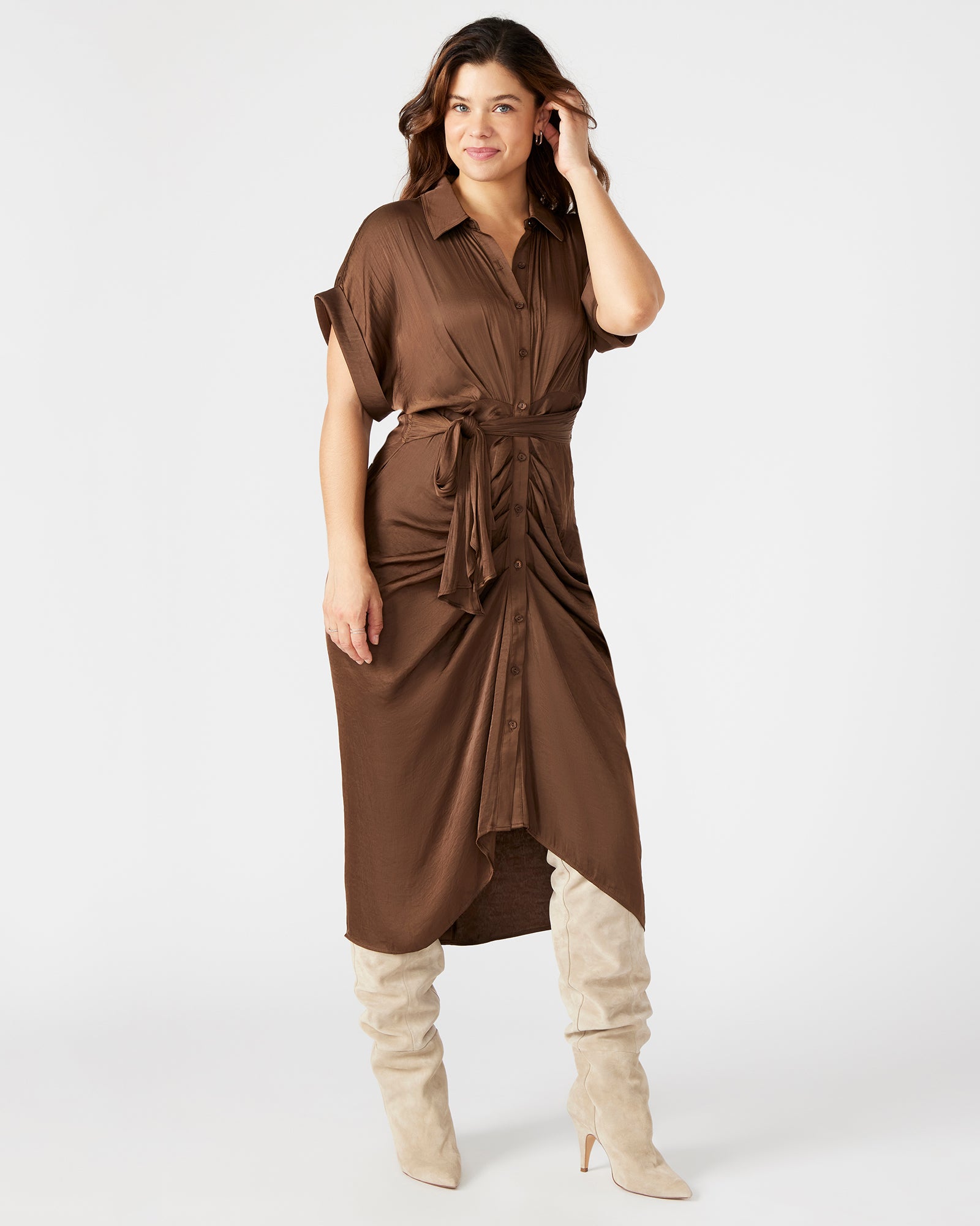 Close-up of the Tori dress's tie-front detail in chocolate brown satin fabric
