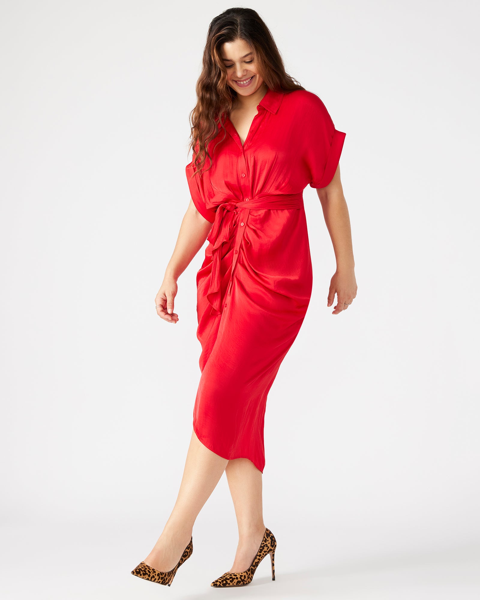 Close-up of the rolled collar and cuffed sleeves on the Tori red dress