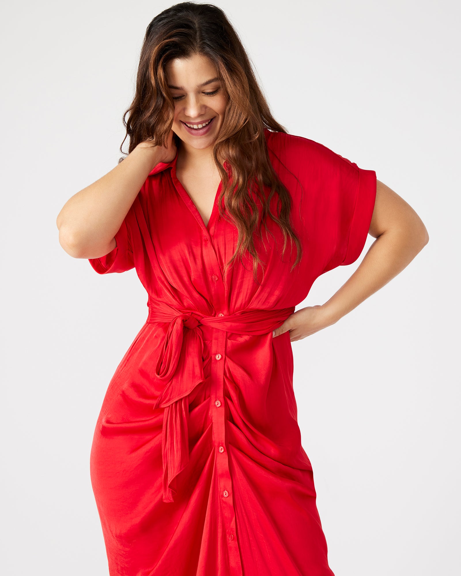 Model wearing the Tori dress with a tie-front waist for a chic daytime look