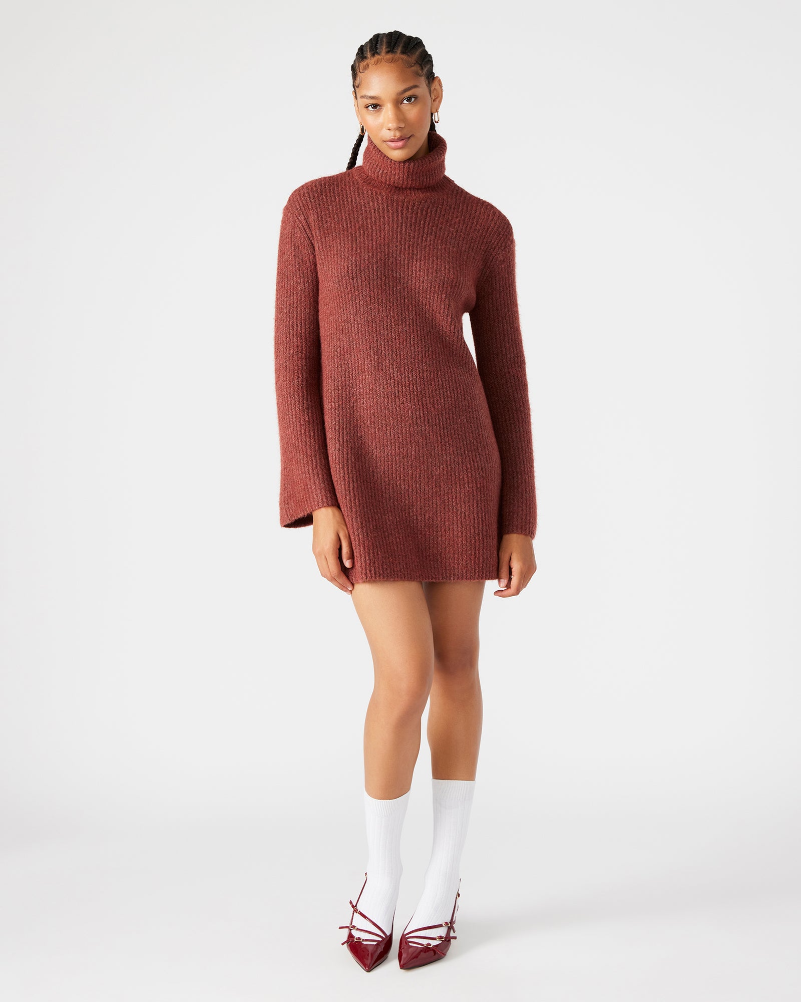 Front view of a chic rust turtleneck sweater dress, perfect for casual wear.