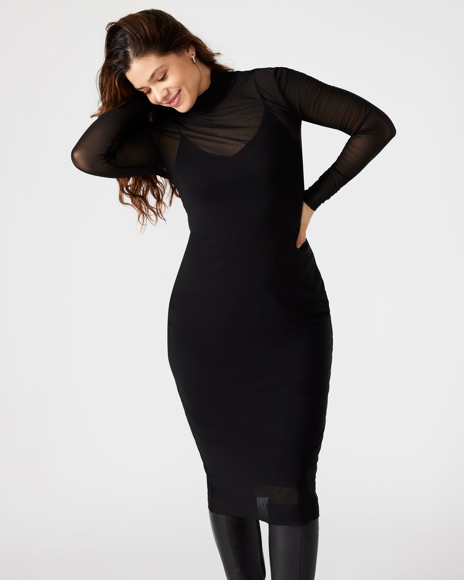 Close-up of the mesh fabric and adjustable straps on the VIVIENNE dress
