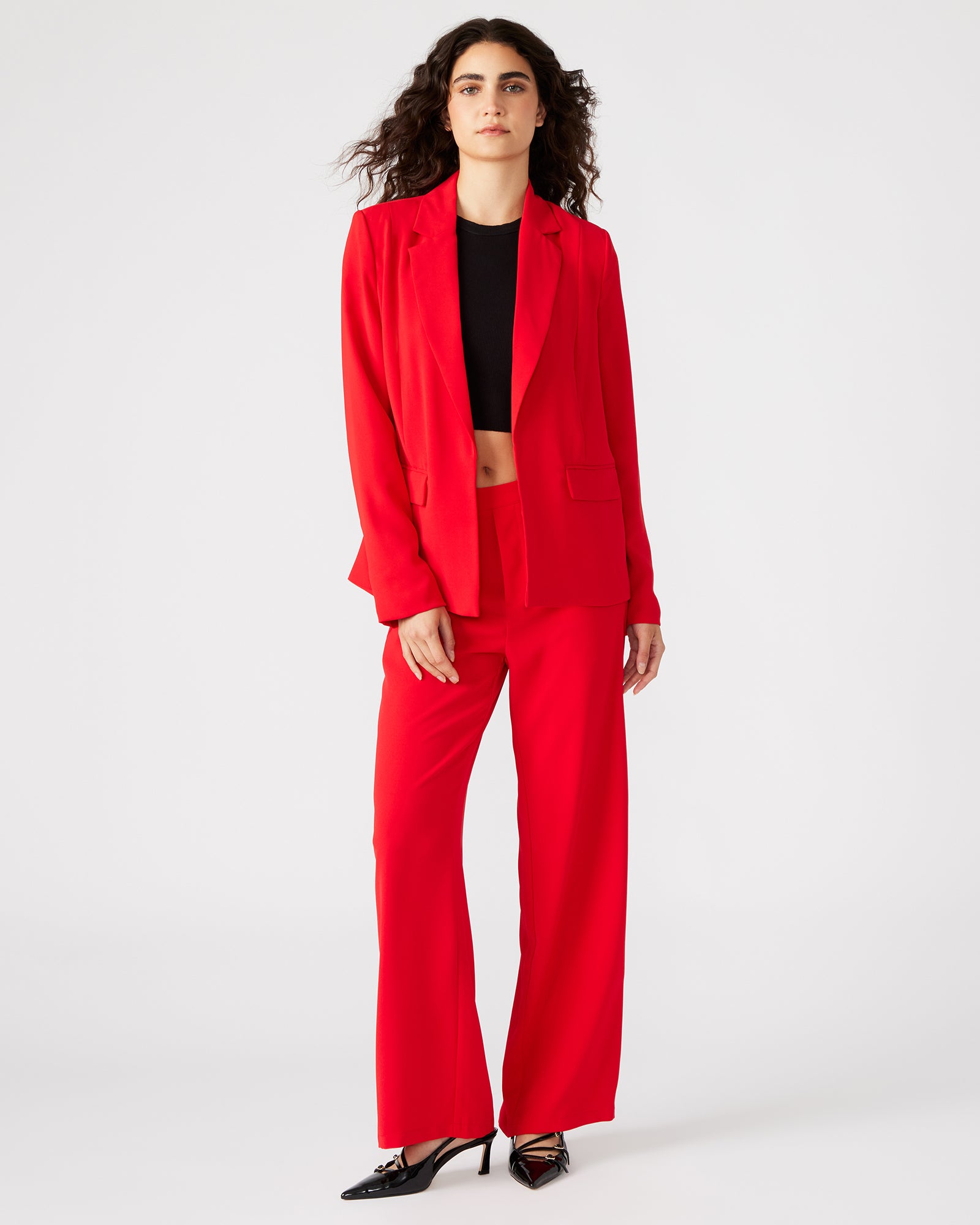 Model wearing wide leg Payton trousers, perfect for a casual outing.