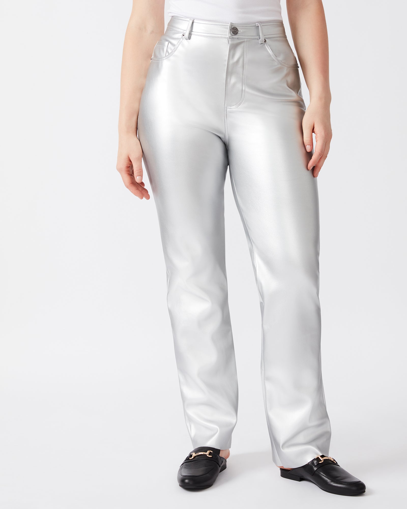 Back view of faux leather pants highlighting the sleek silhouette.