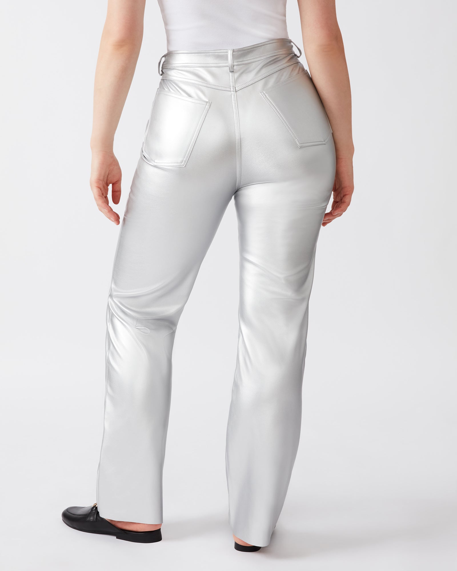 Close-up of the straight-leg detailing and zipper fly on LOREN pants.