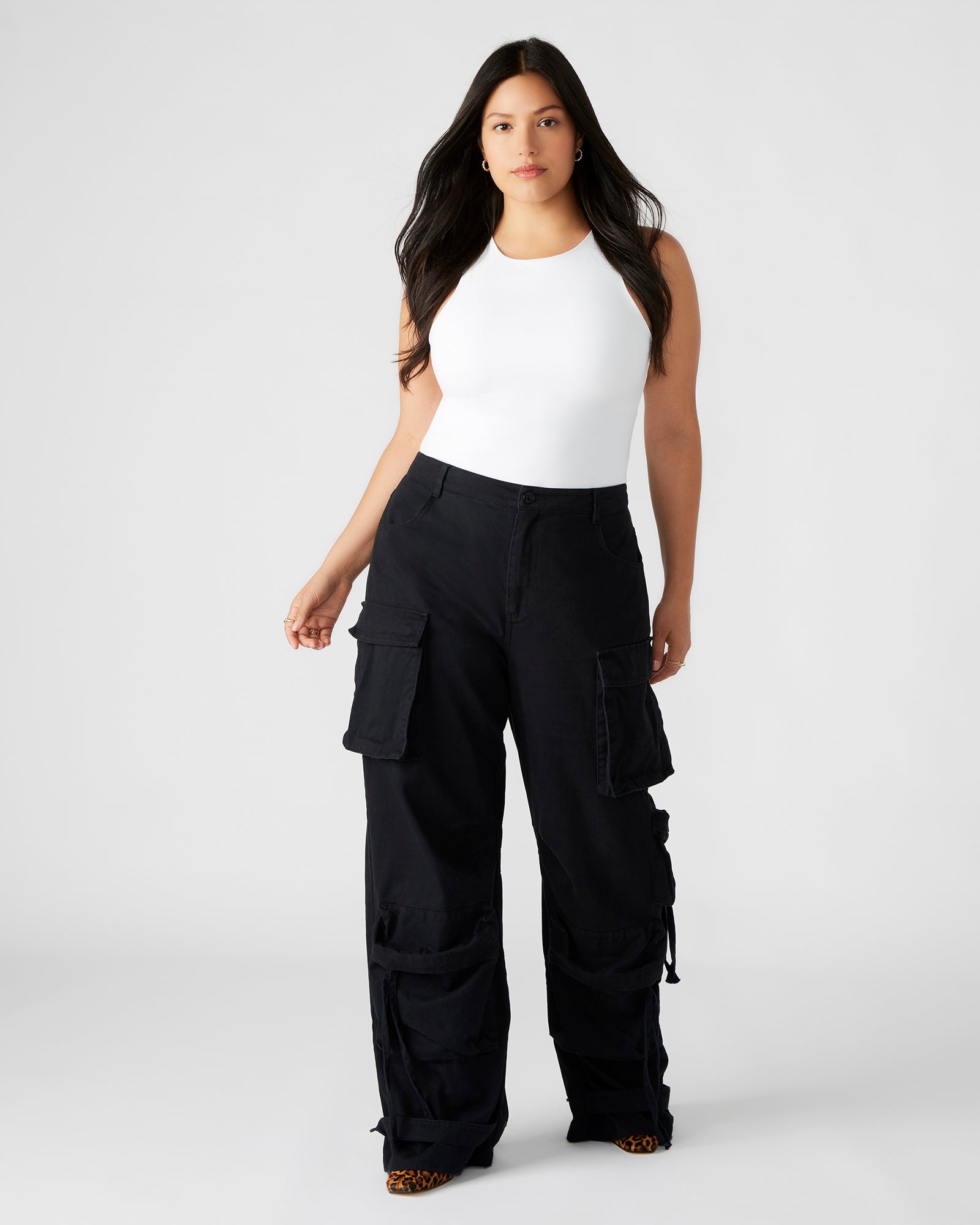 Front view of black cargo pants with pockets