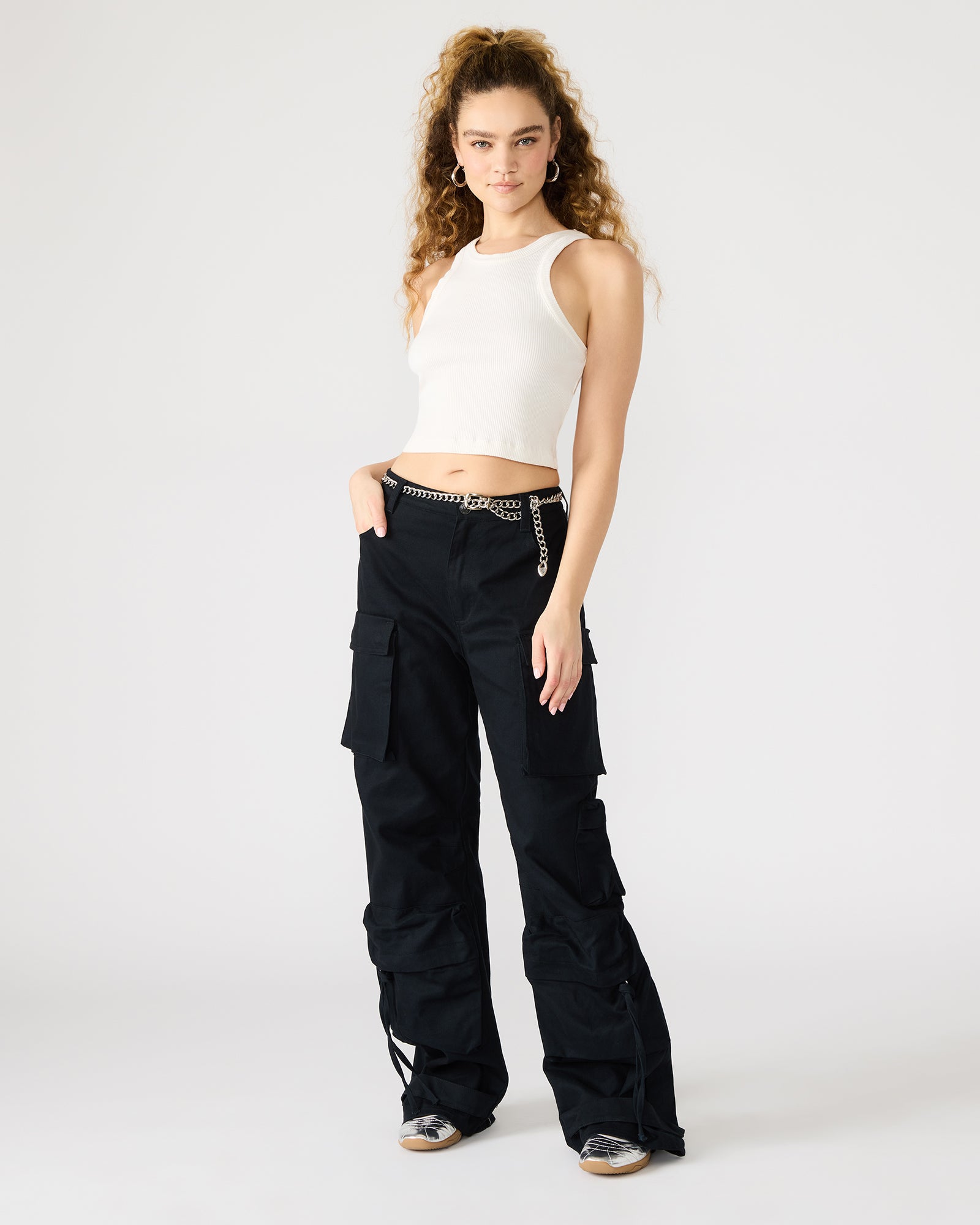 Side view showcasing the wide leg design of the cargo pants