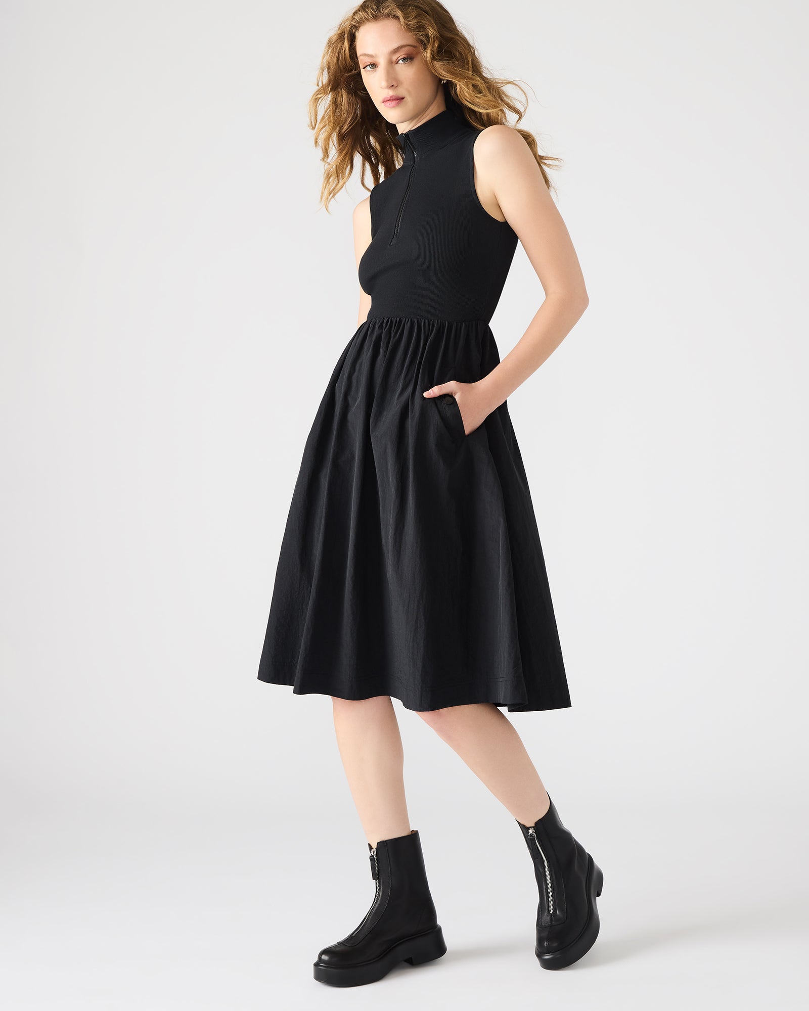 Close-up of the fabric detail on the Berlin Midi Dress, showcasing its chic design.