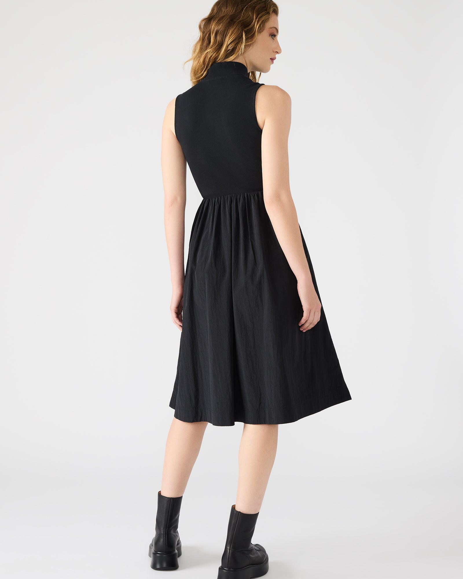 Back view of the Berlin Midi Dress, highlighting the zipper and mock neck.