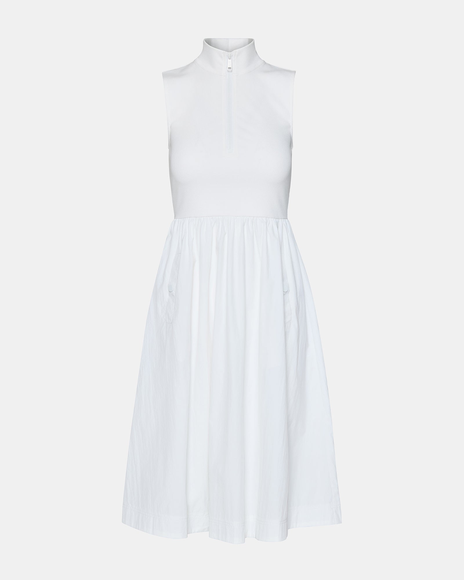 Model styled in the white midi dress for spring fashion in New York