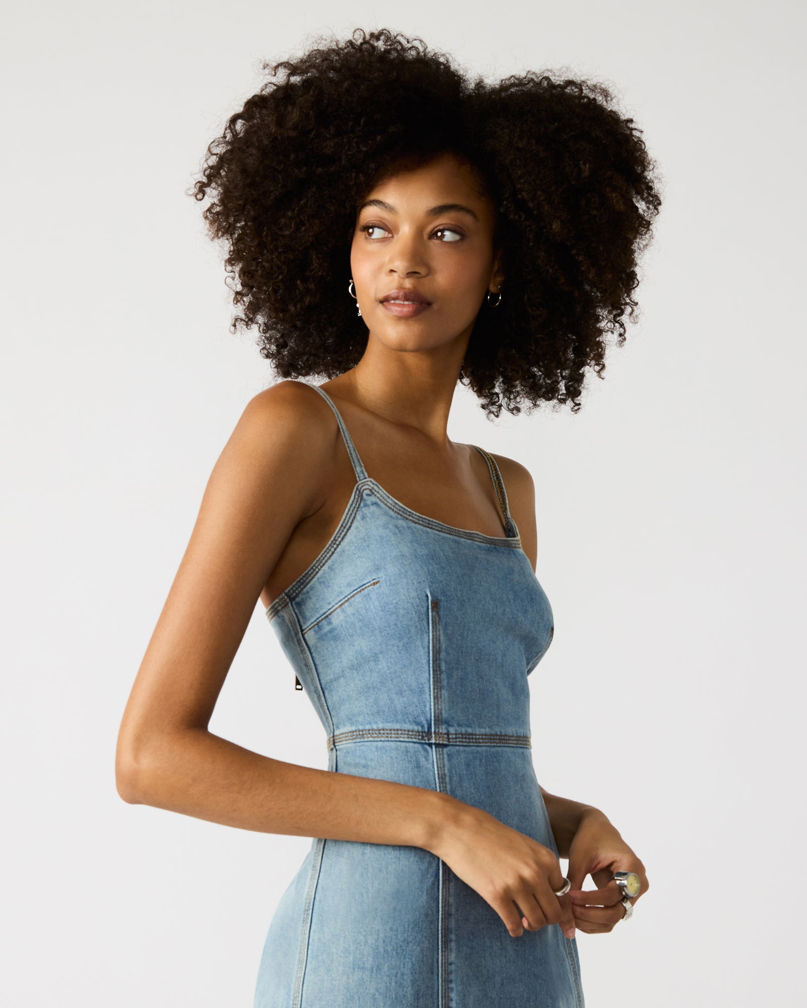 Detail shot of fitted dress waist with slit and stretch fabric
