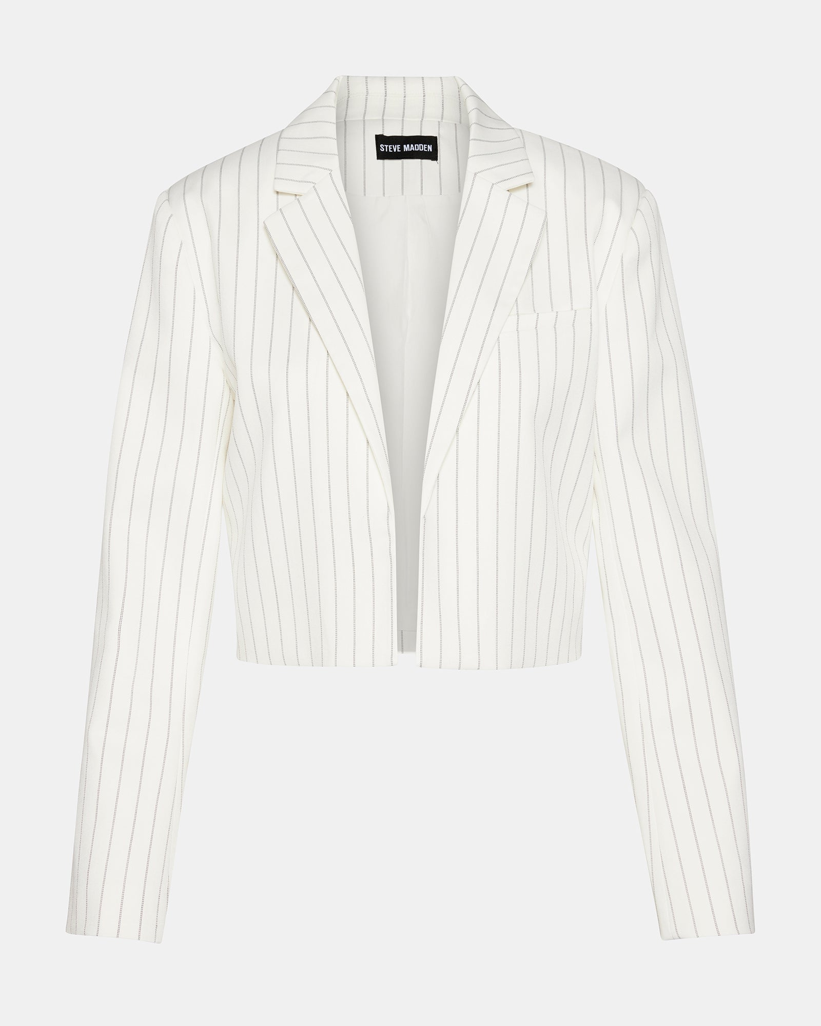 Front view of cropped black and white blazer on model