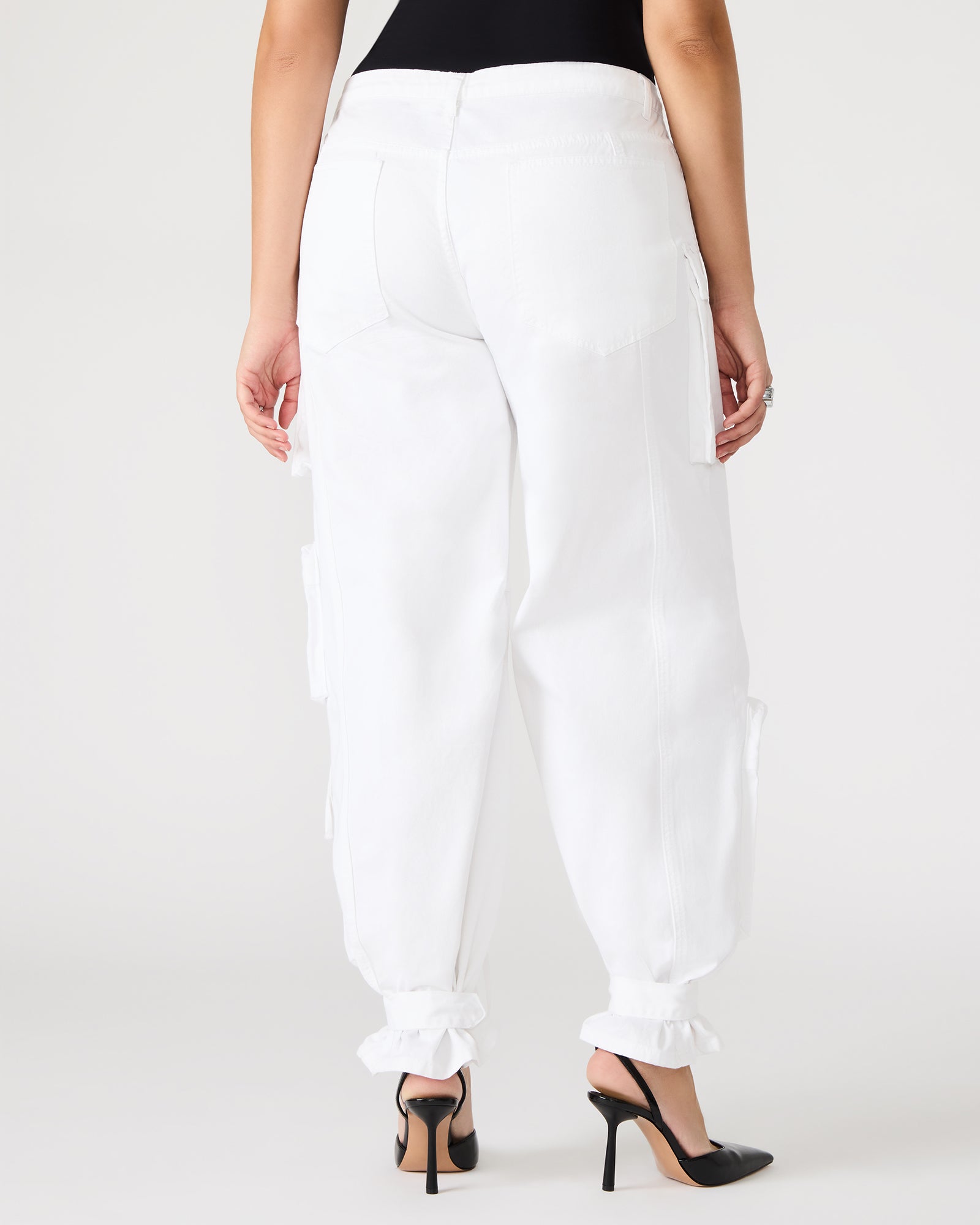 Side view of Duo Wide Leg Cargo Pants in White, highlighting adjustable ankle straps and pockets.