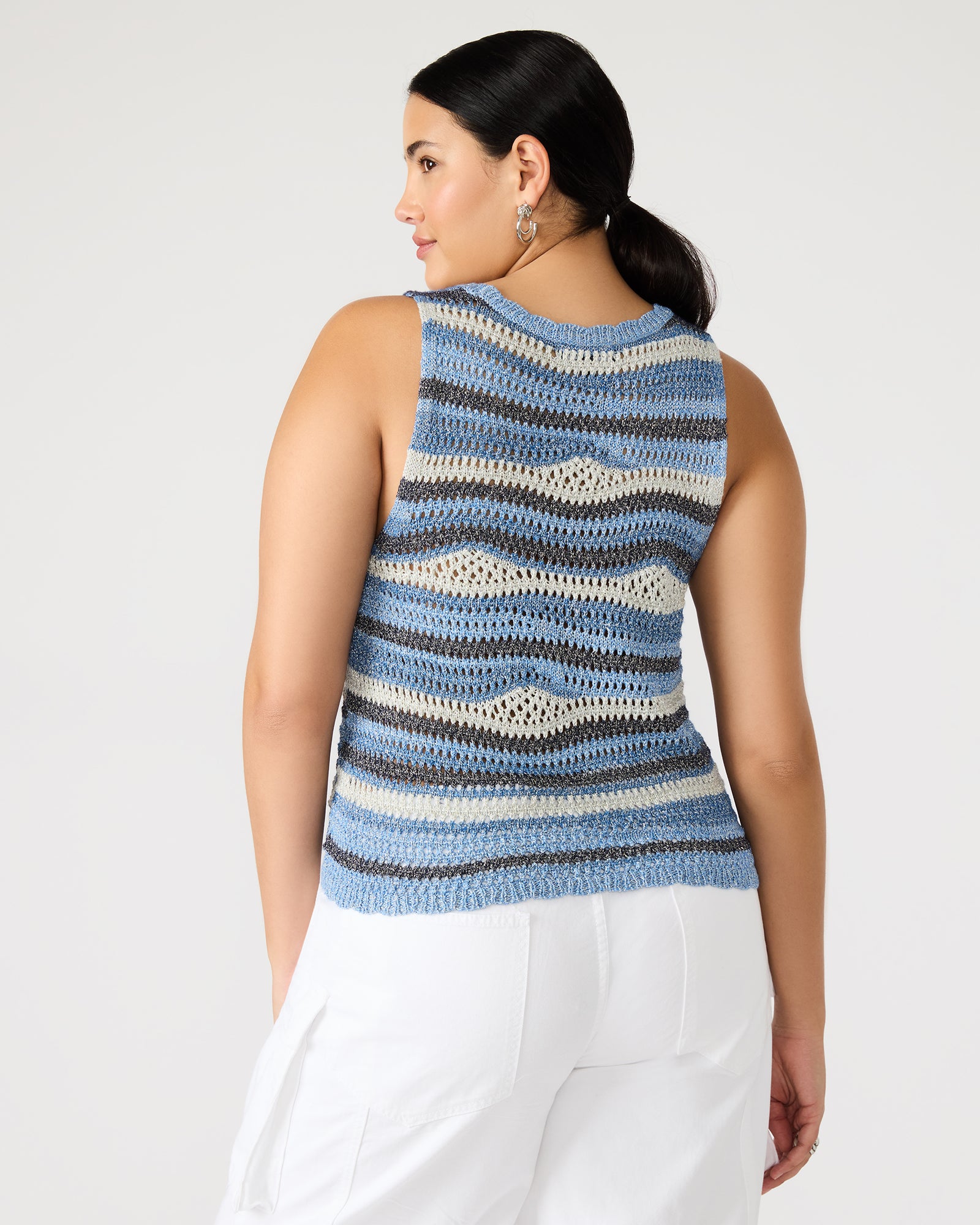 Close-up of the knit crochet fabric and metallic accents on the HANNAH crochet tank top