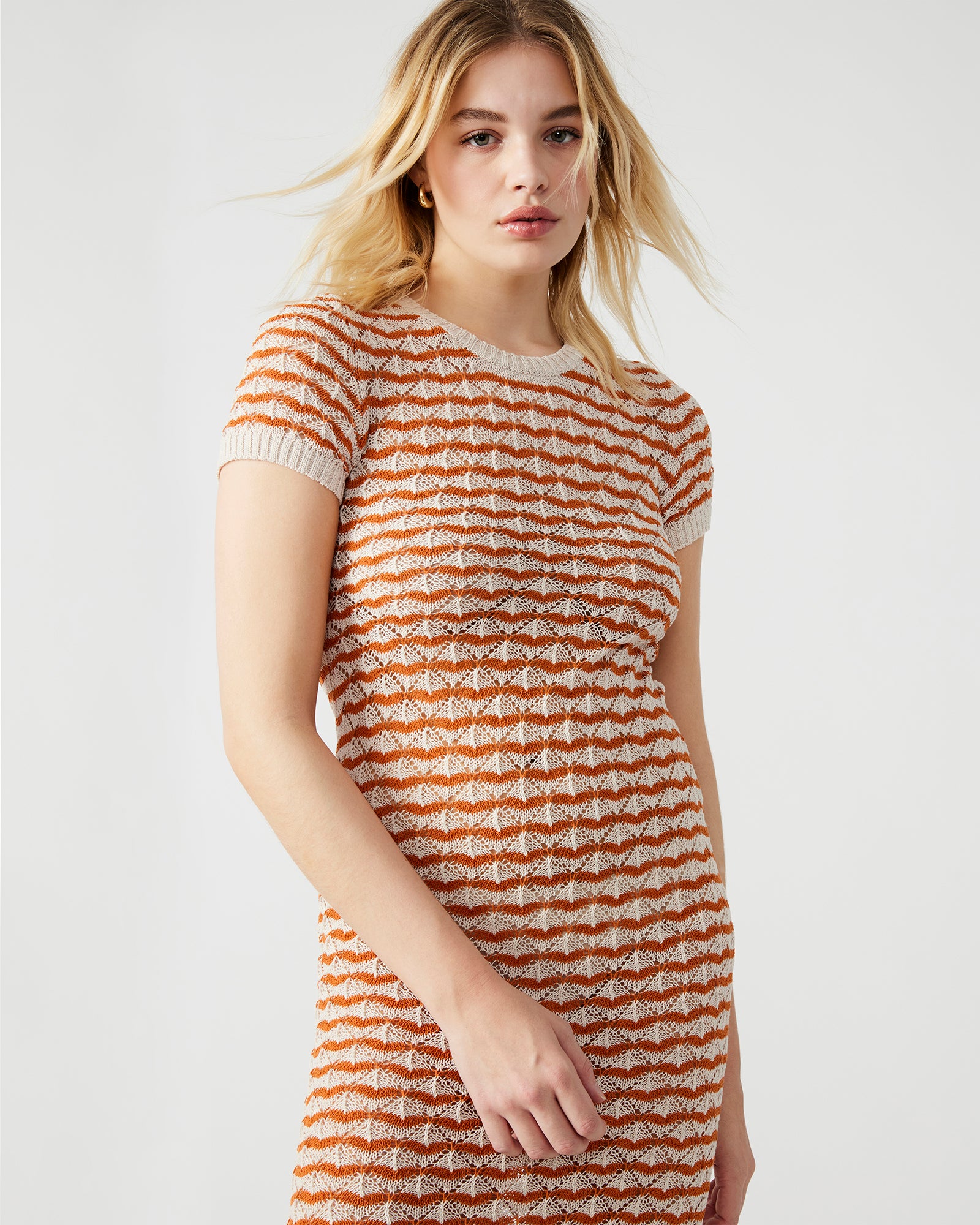 Side angle showing the slit detail of the bodycon sweater maxi dress