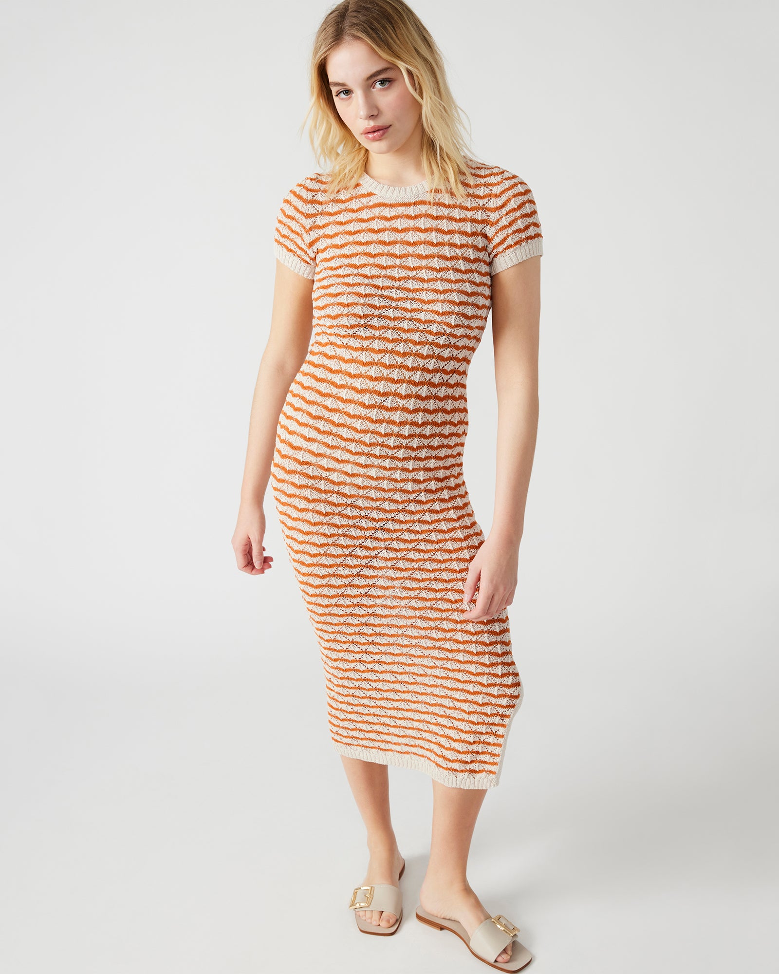 Front view of Theresa striped sweater dress worn outdoors in Santa Monica