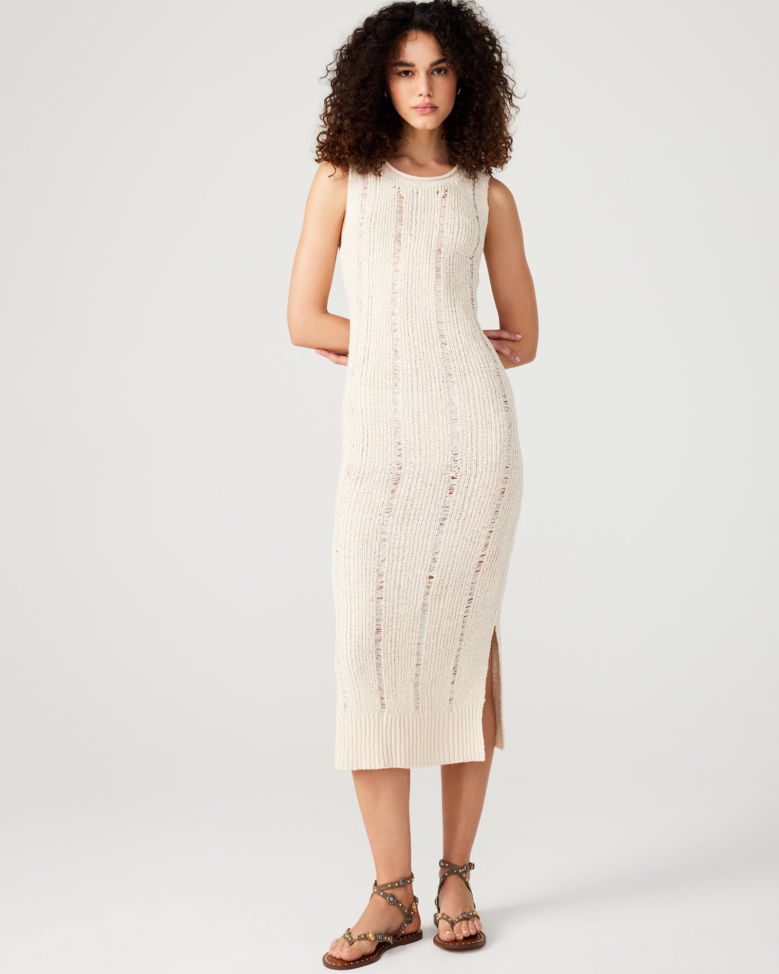 Front view of the Amirah beige sweater midi dress showcasing its stylish design.