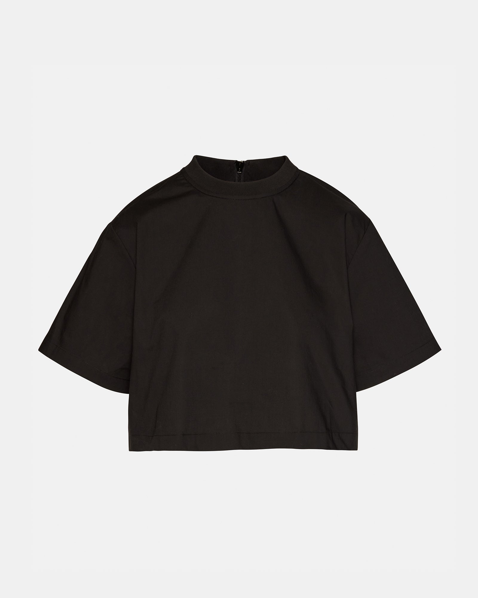 Front view of the chic boxy cropped t-shirt in black, showcasing the zipper detail.
