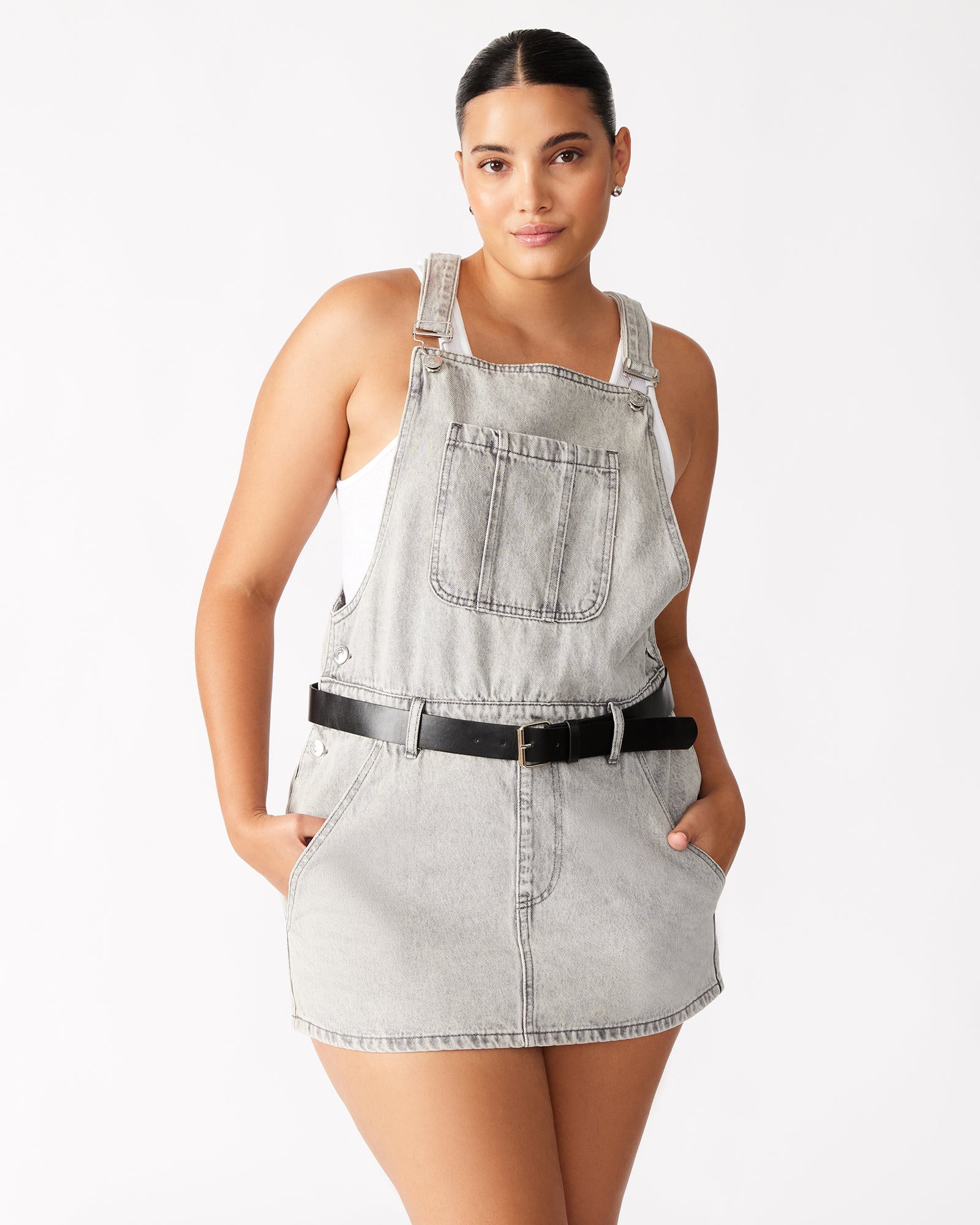 Model wearing the TAMIA denim dress with casual accessories for daytime wear