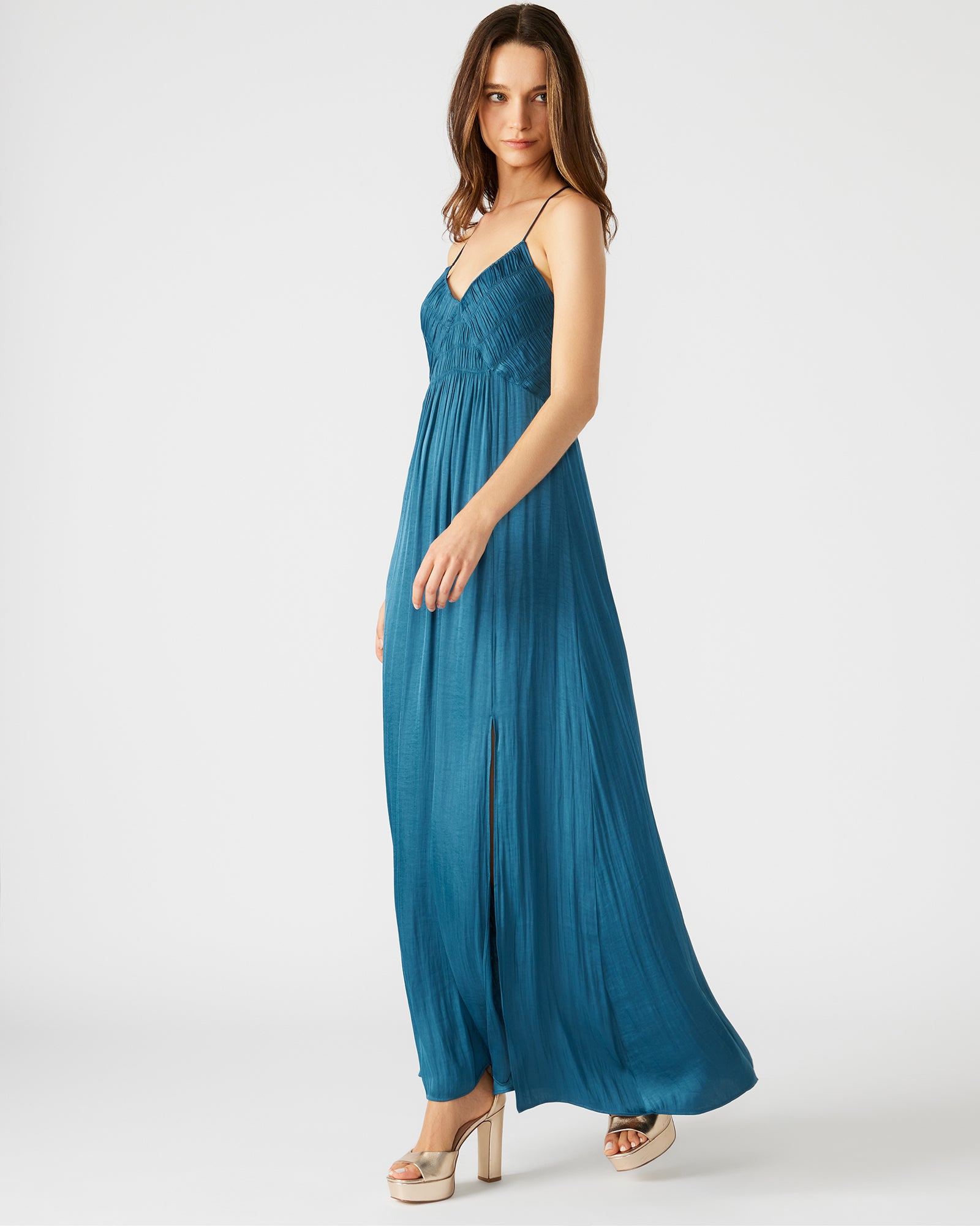 Brianna flowy dress in light blue, showcasing side slit design