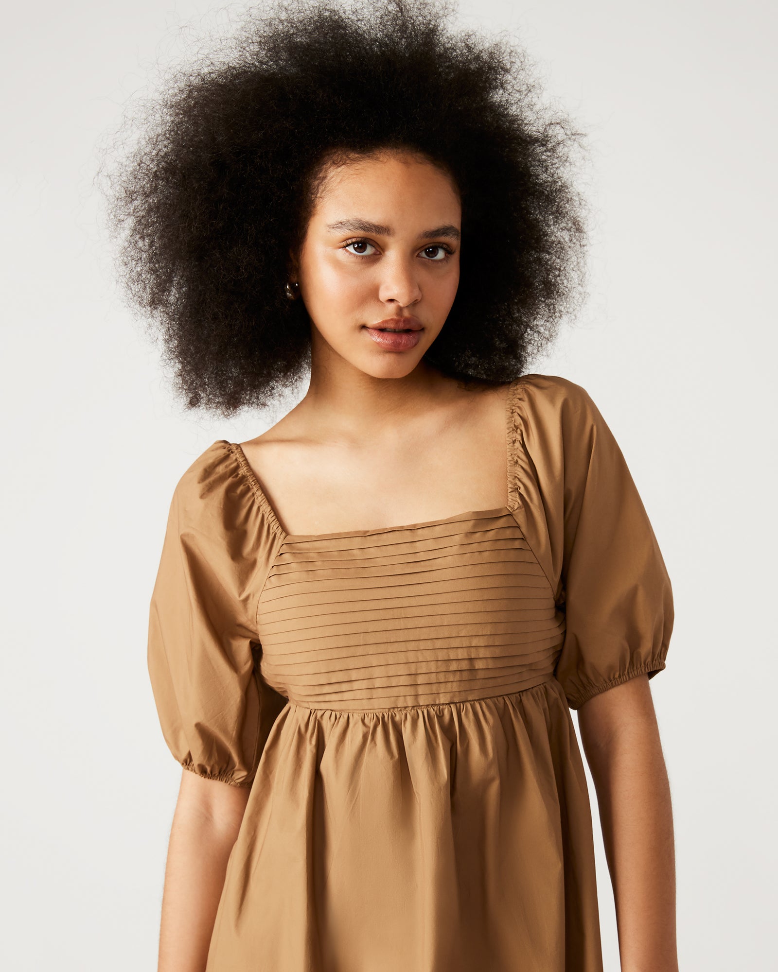 Close-up of the ruffled detailing on the Inara cocktail dress.