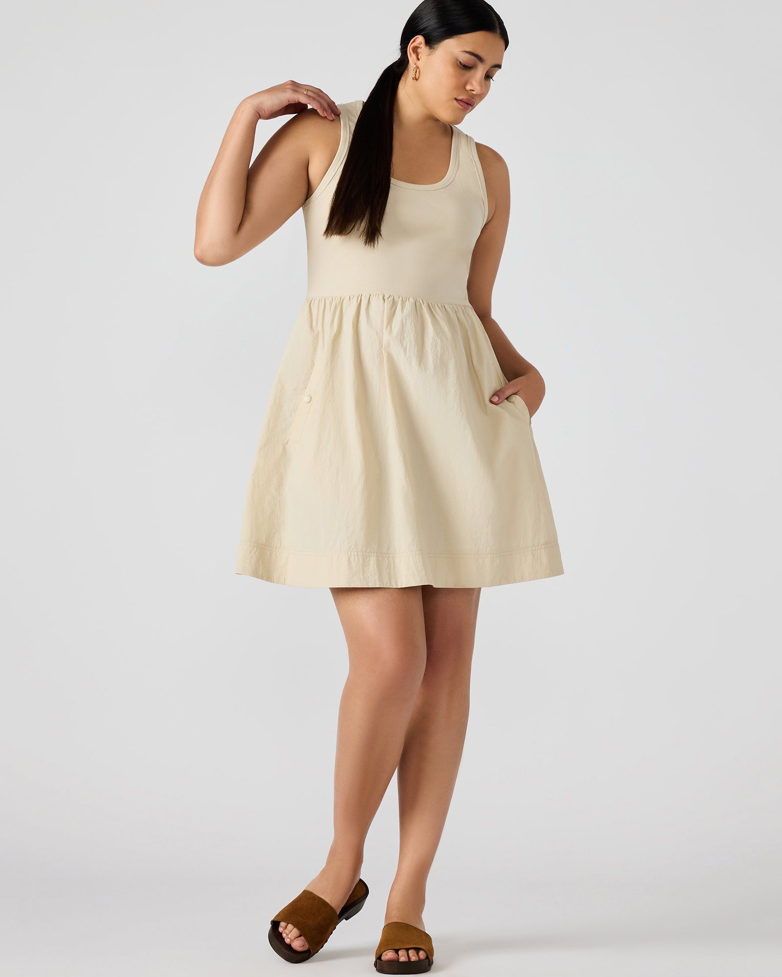 Front view of the Sandy Flounce Mini Dress showcasing its ruffle detail.