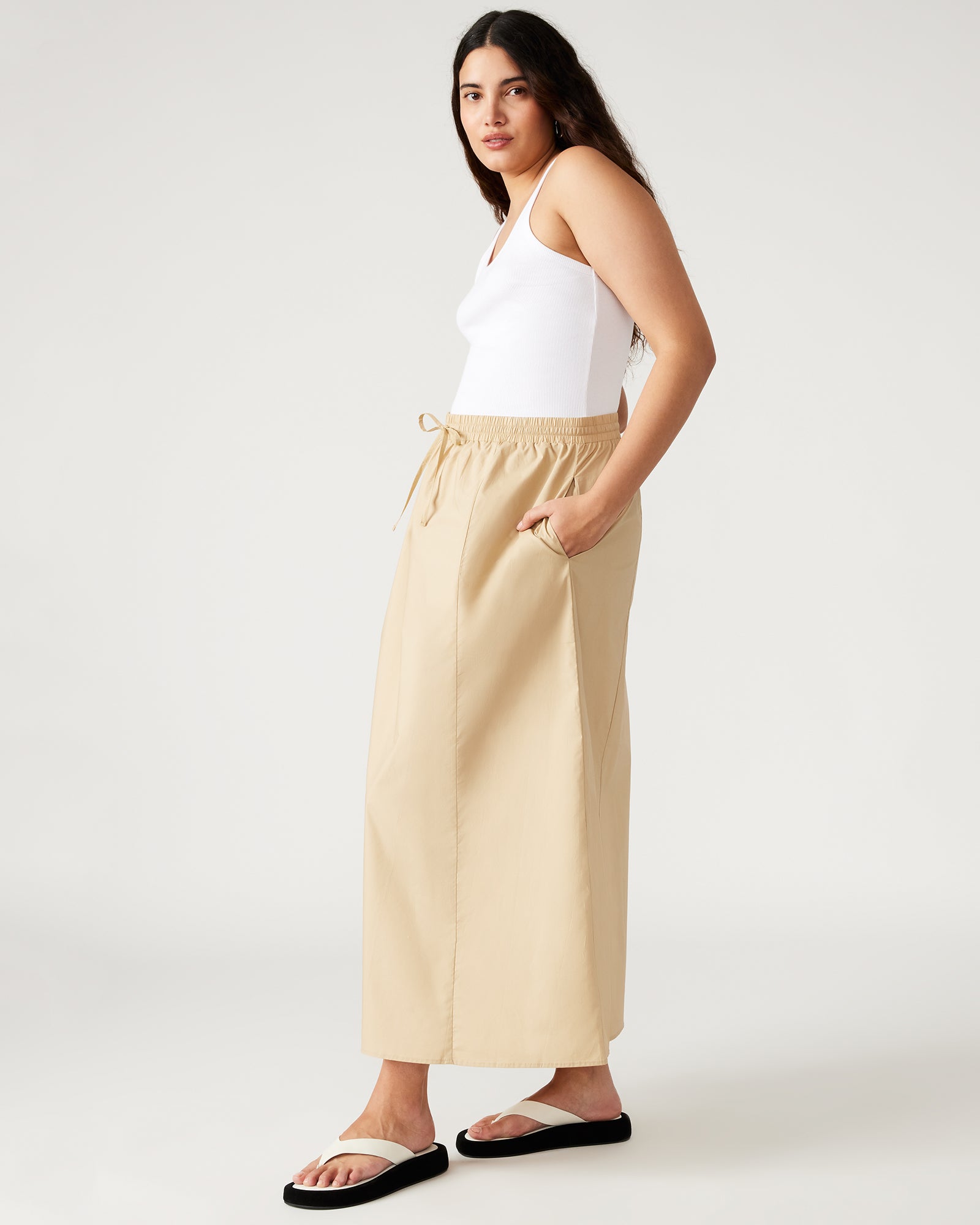 Front view of khaki A-line maxi skirt with pockets