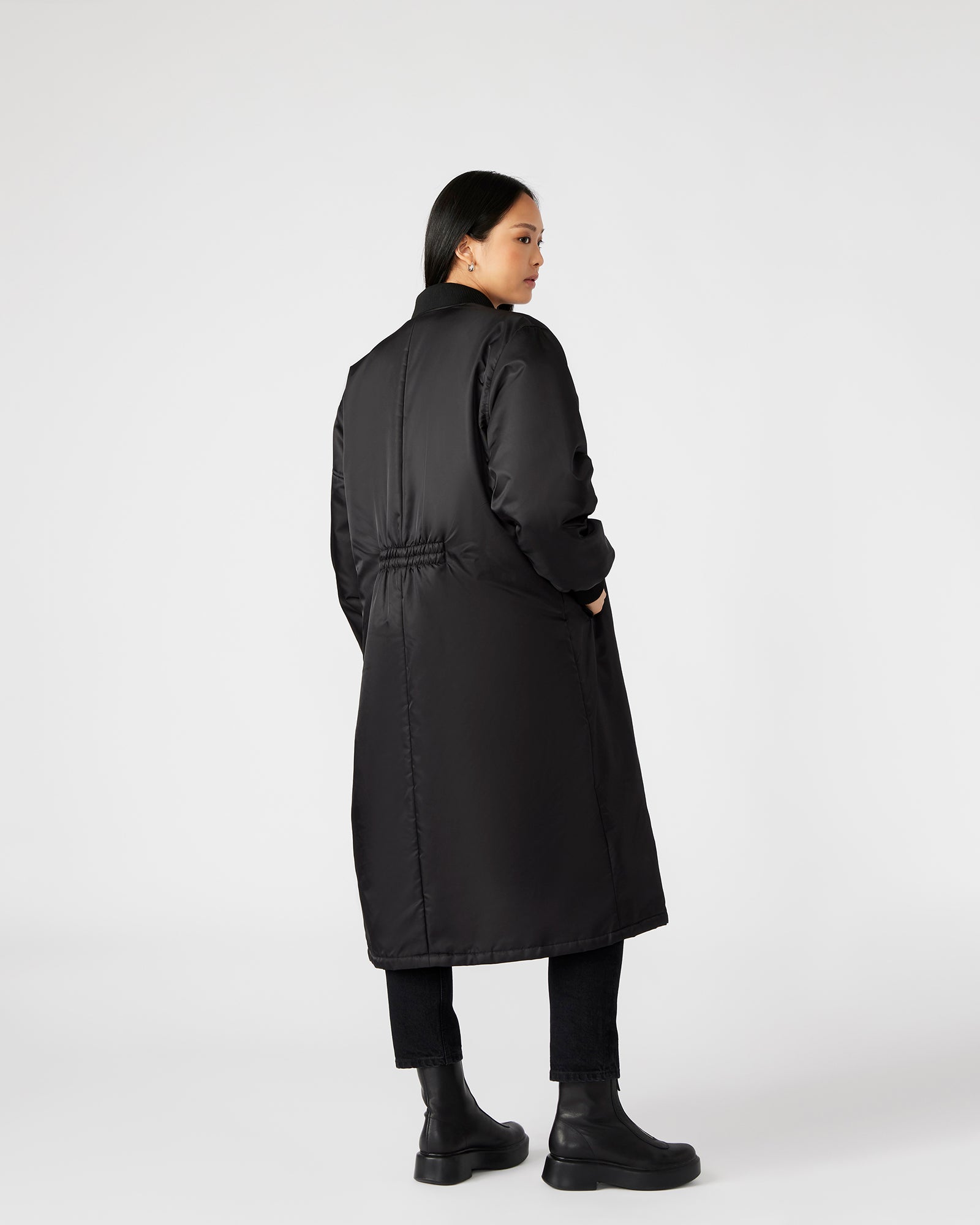 Front view of the VINDY long bomber coat in black, showcasing its stylish design.