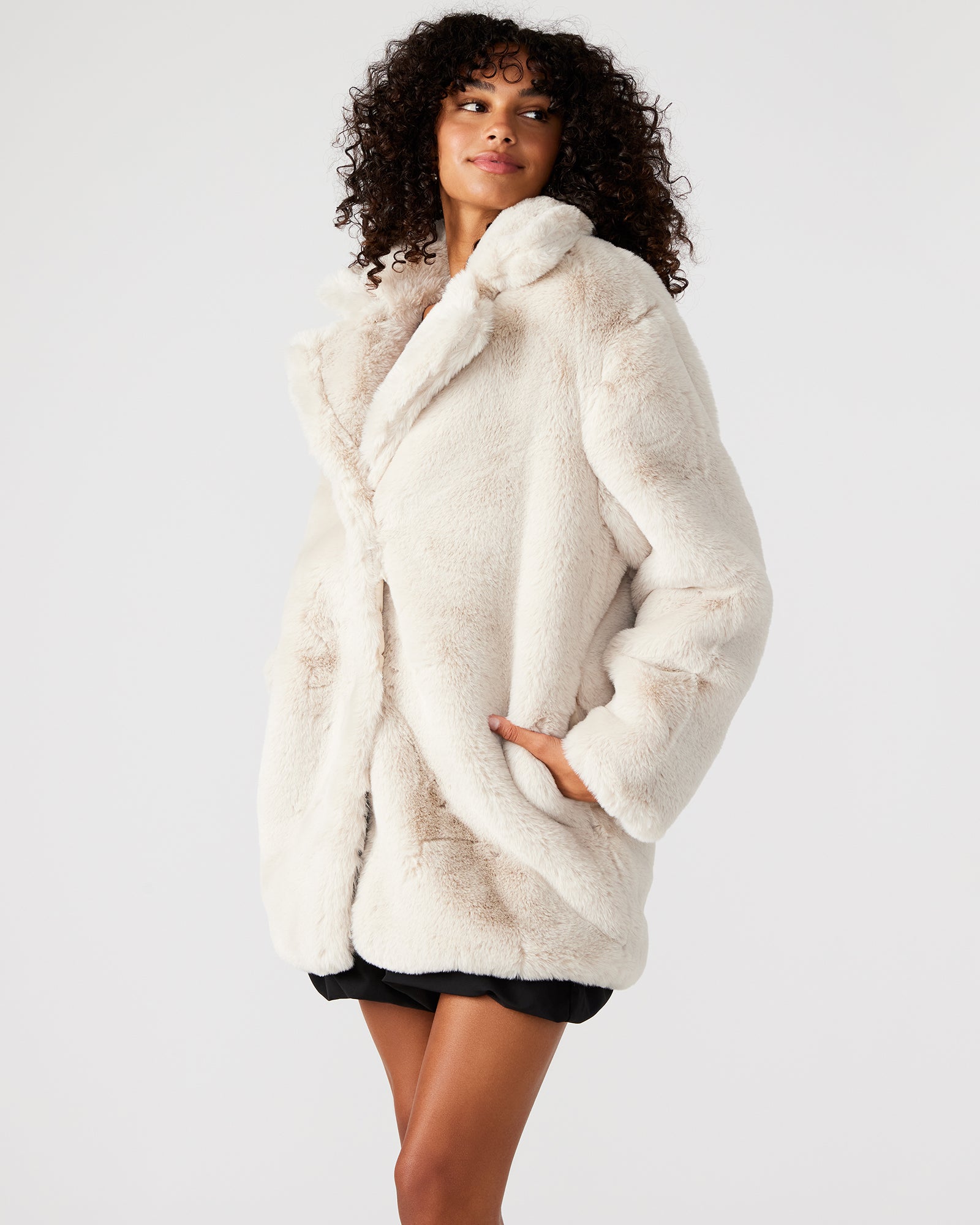 Close-up of the faux fur texture on the winter coat.