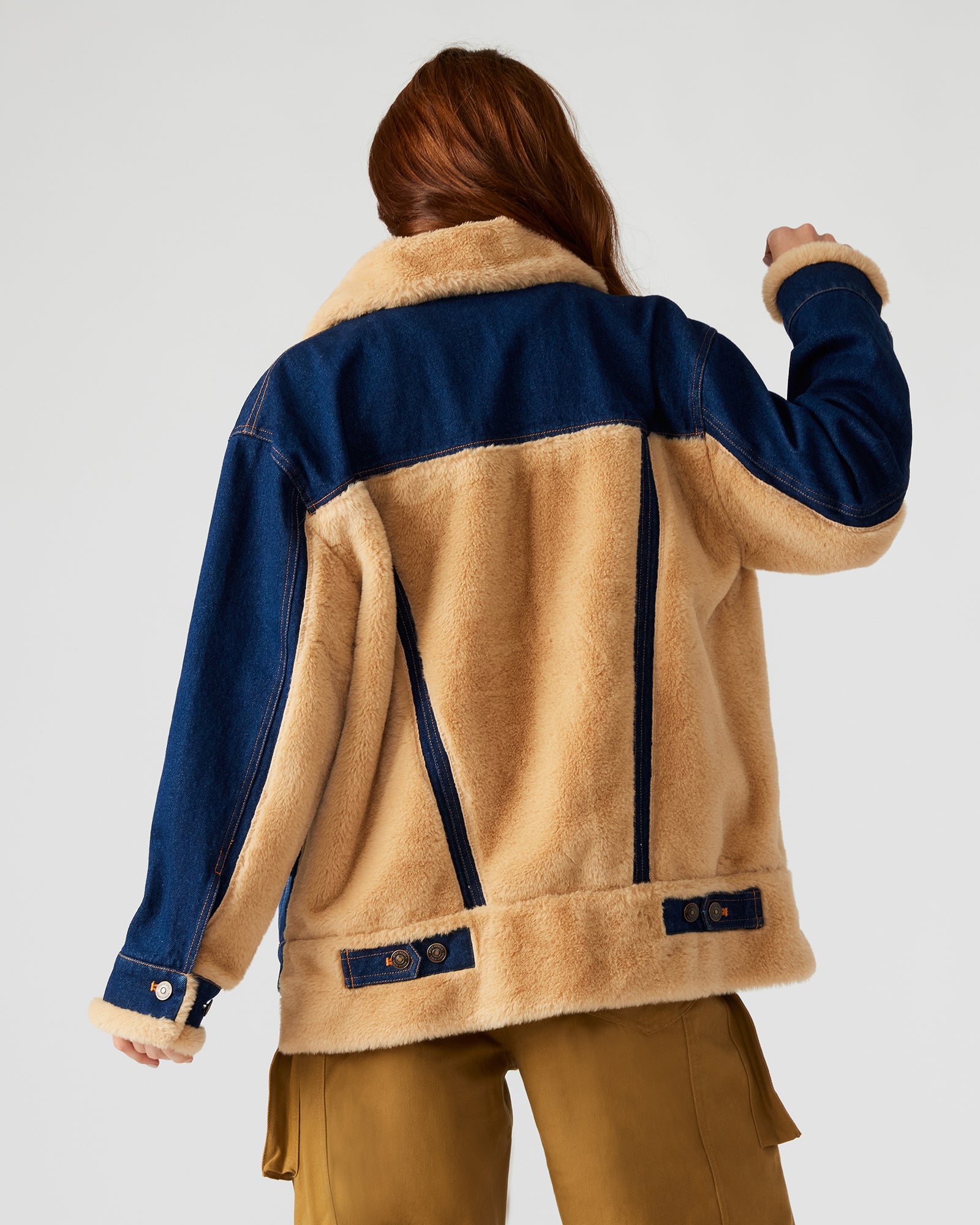 Close-up of fur-trimmed collar on WINONA denim trucker jacket