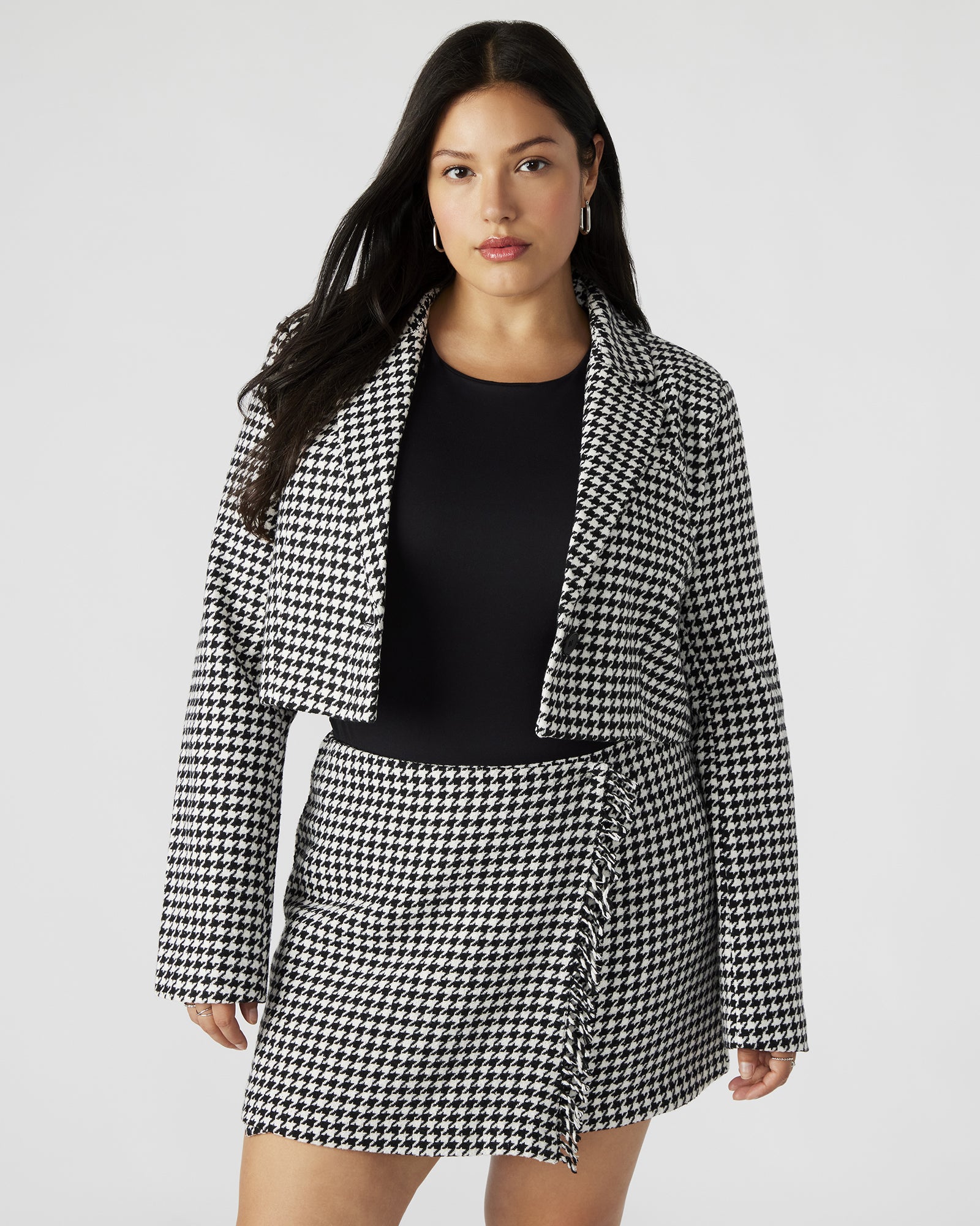 Front view of the women's tweed blazer on a hanger