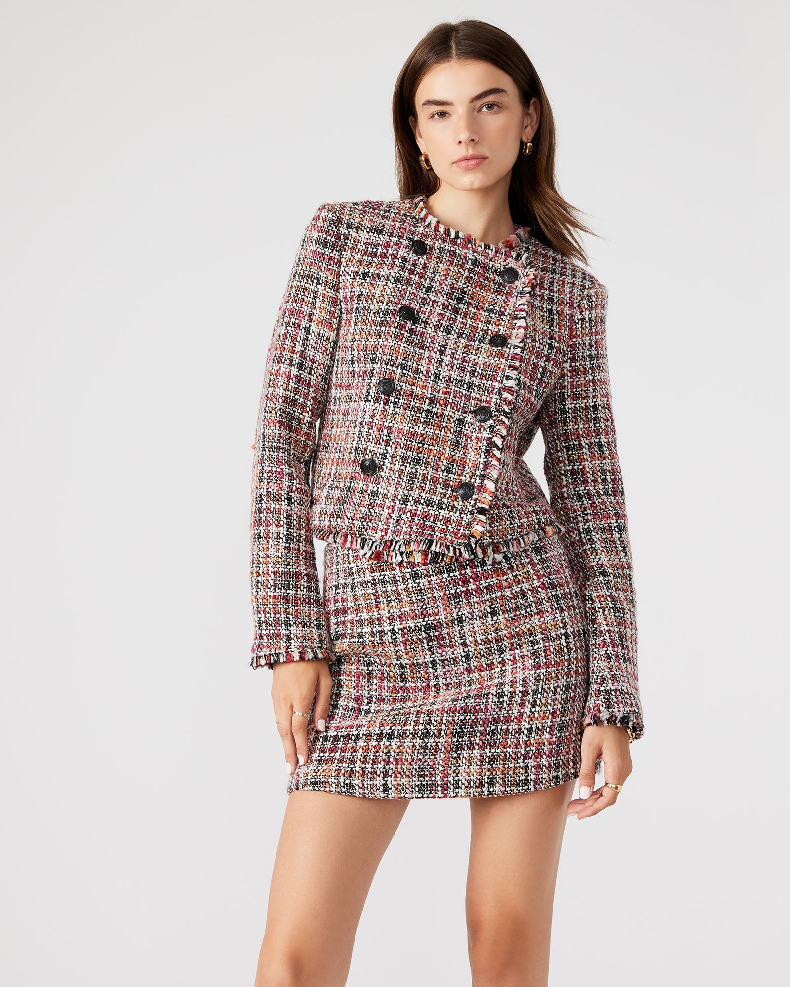 Back view of the Antoinette collarless tweed blazer, emphasizing the fully lined interior.
