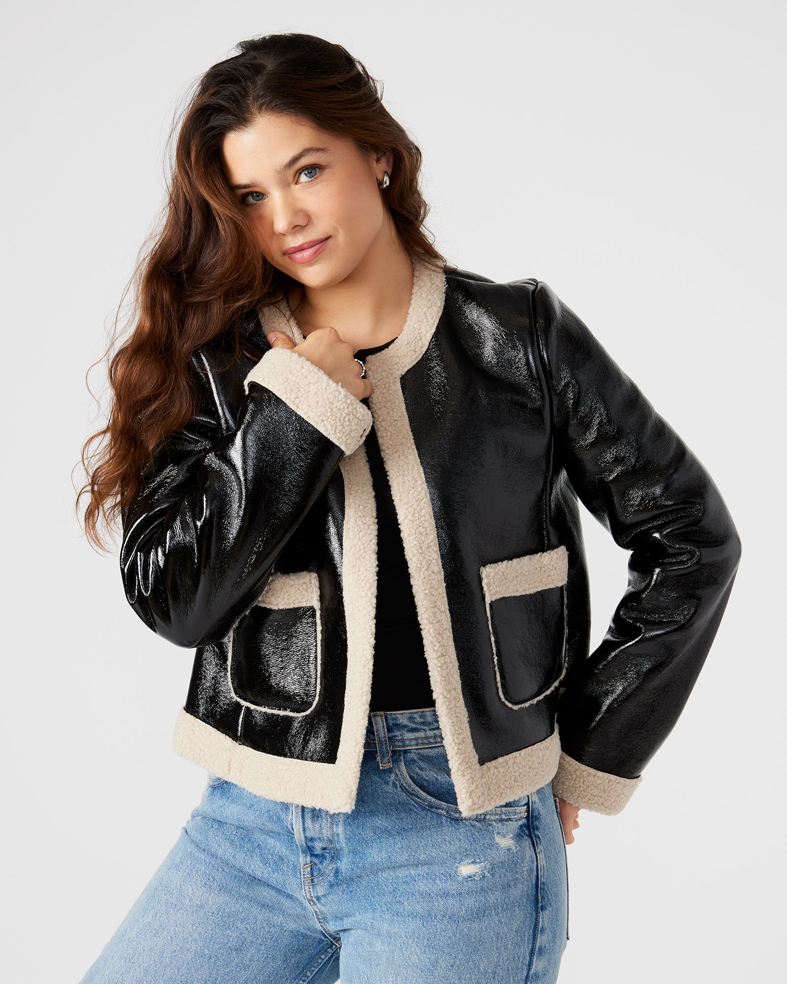 Front view of the faux leather sherpa open jacket, showcasing its collarless design.