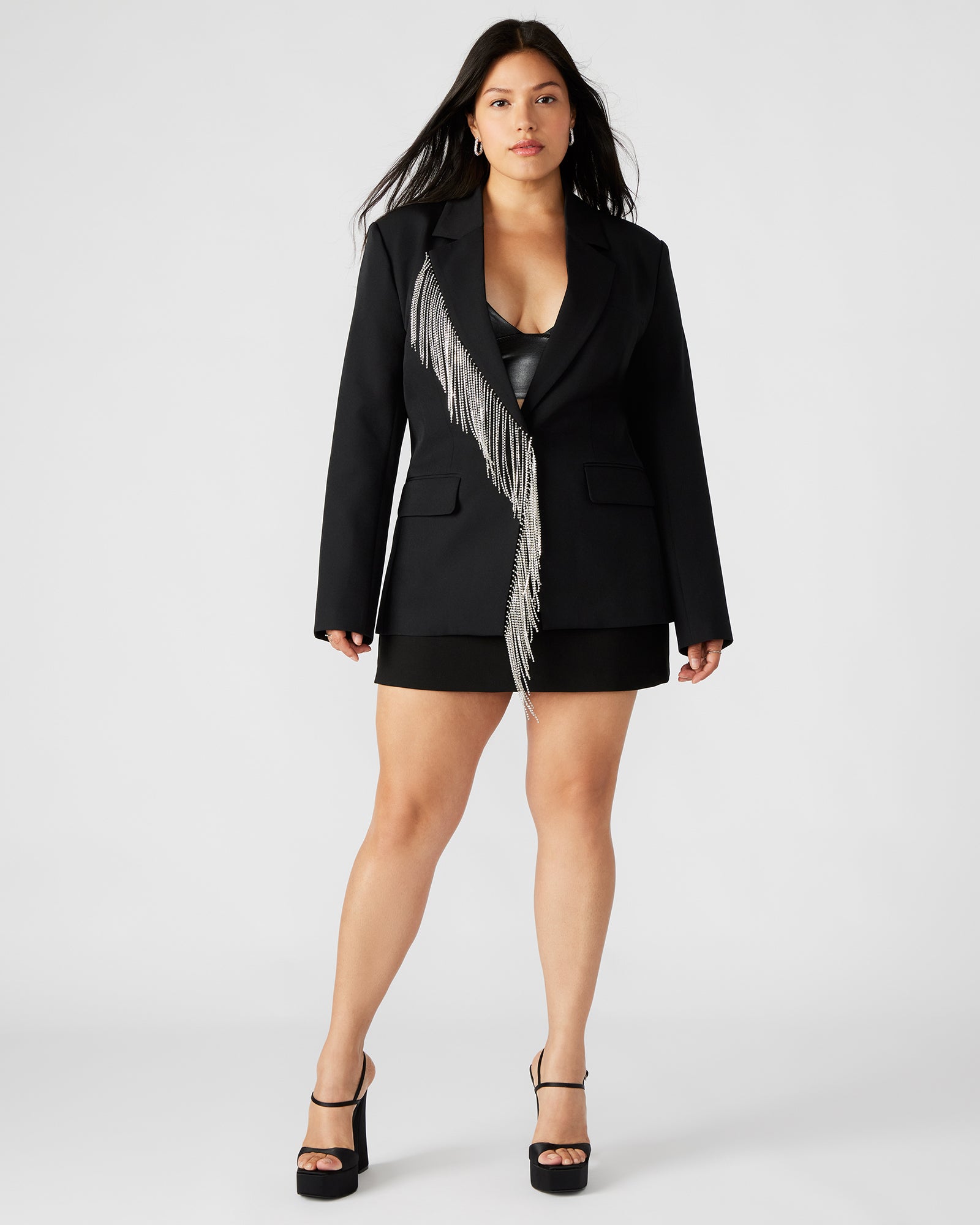 Back view of party blazer with vented hem, ideal for urban nightlife