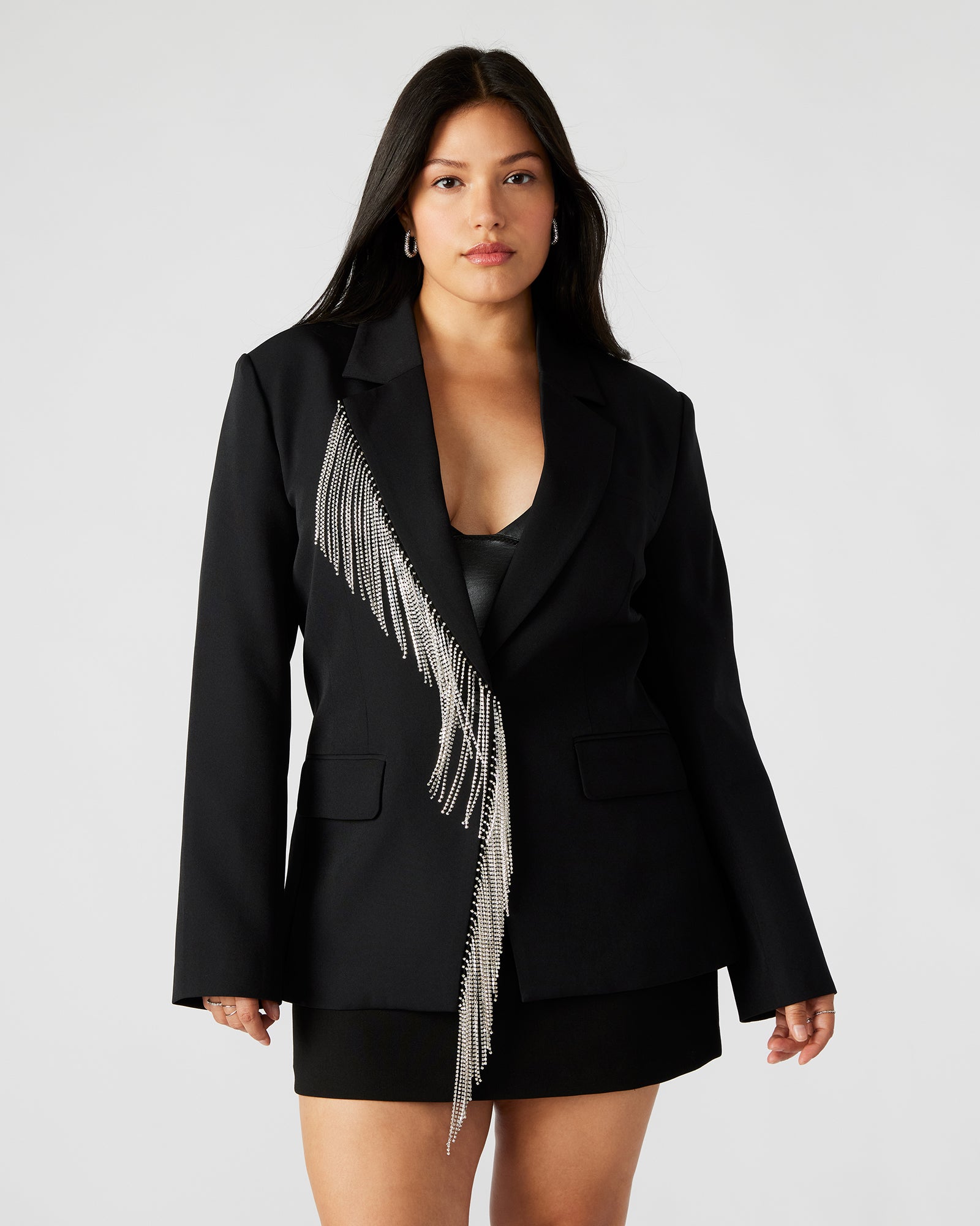 Back view of party blazer with vented hem, ideal for urban nightlife
