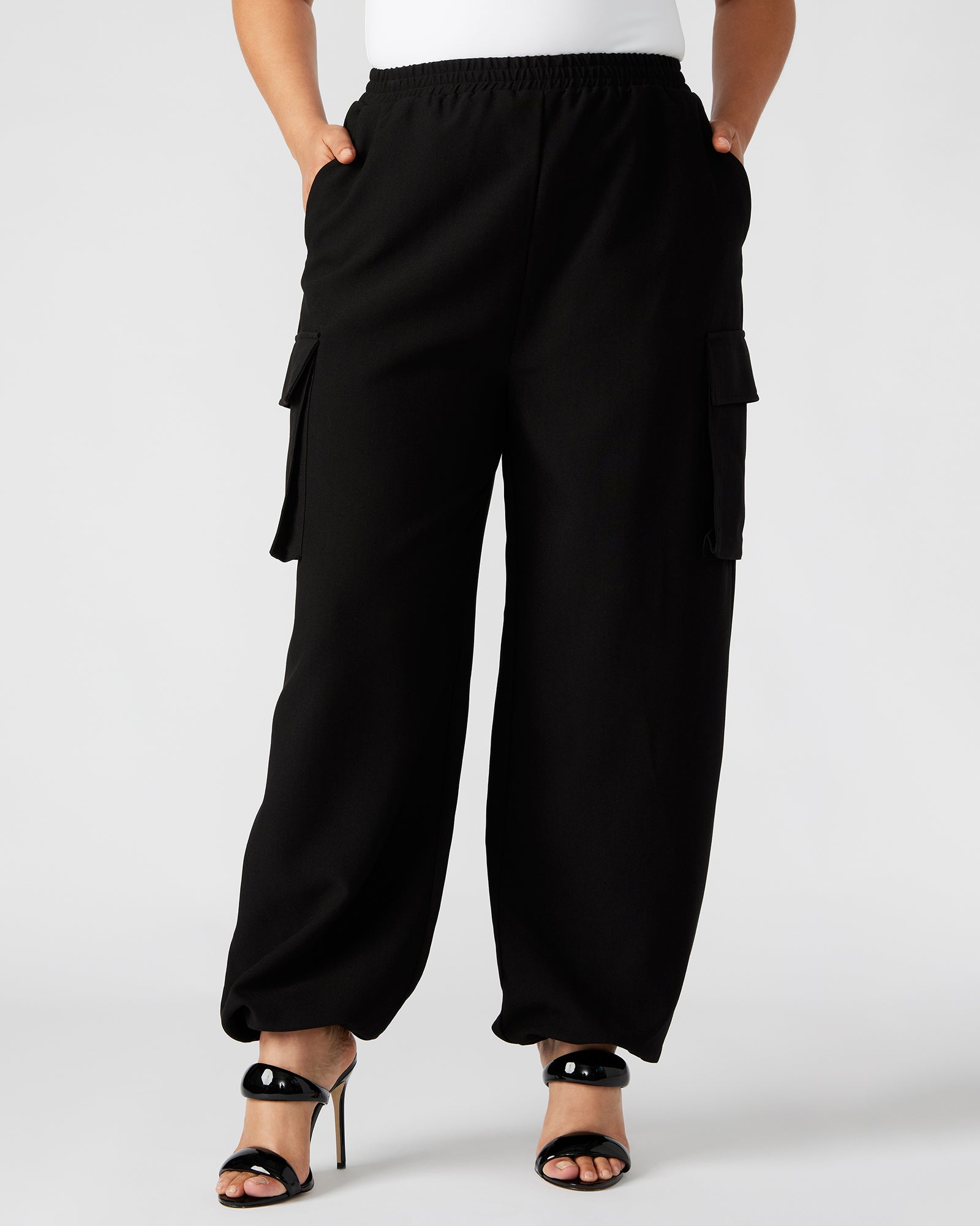 Model wearing black cargo pants on weekend hike in Asheville