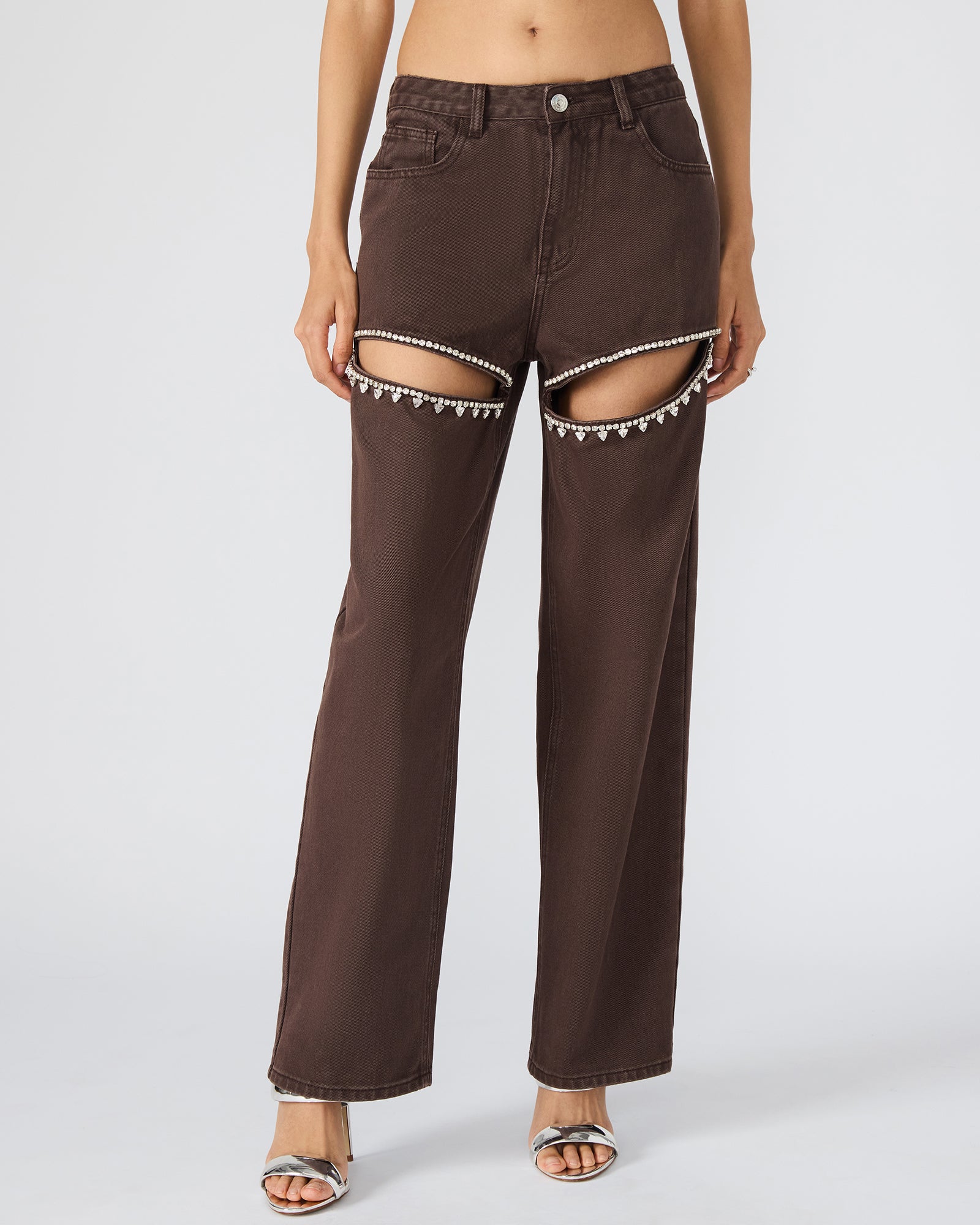 Side view of low rise wide leg jeans showcasing rhinestone cutouts, ideal for a night out.
