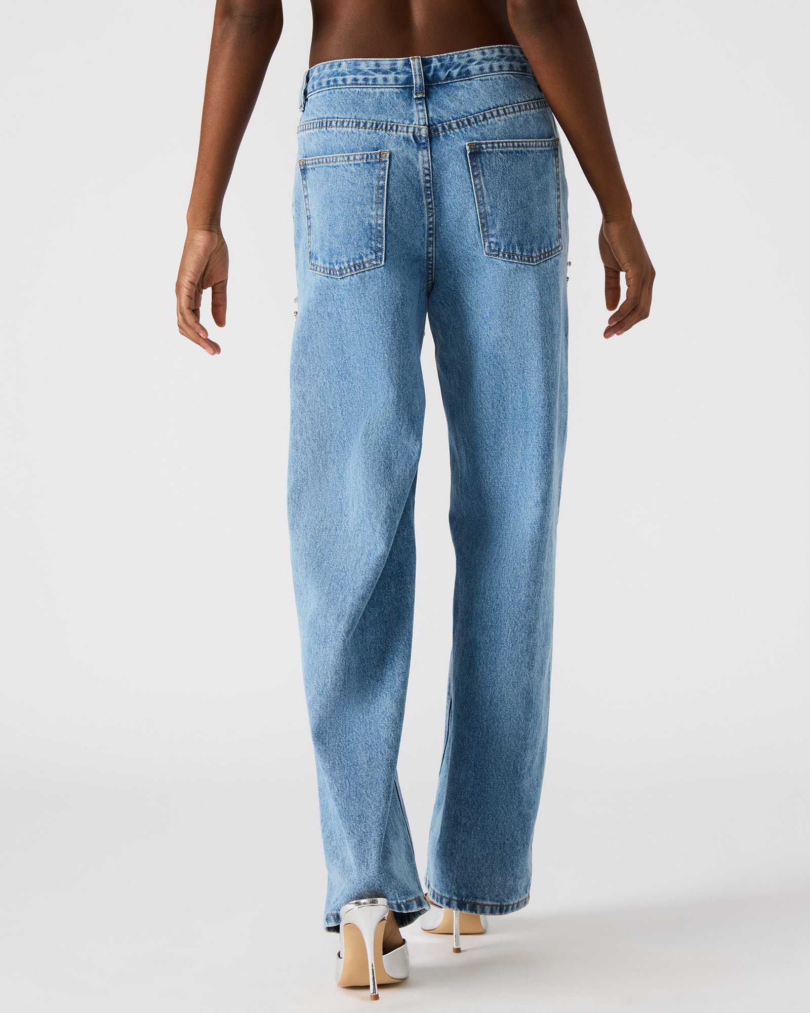 Close-up of rhinestone trim on Taylor jeans, perfect for pairing with heels or boots