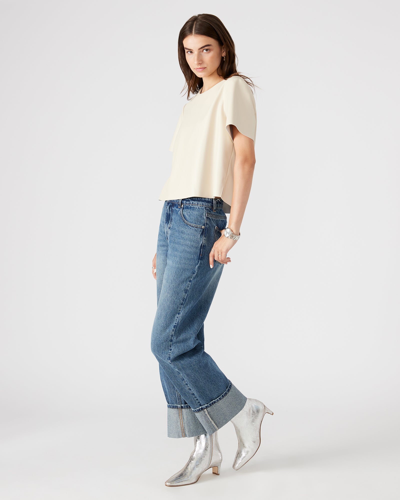 Styled outfit featuring the womens faux leather top with jeans