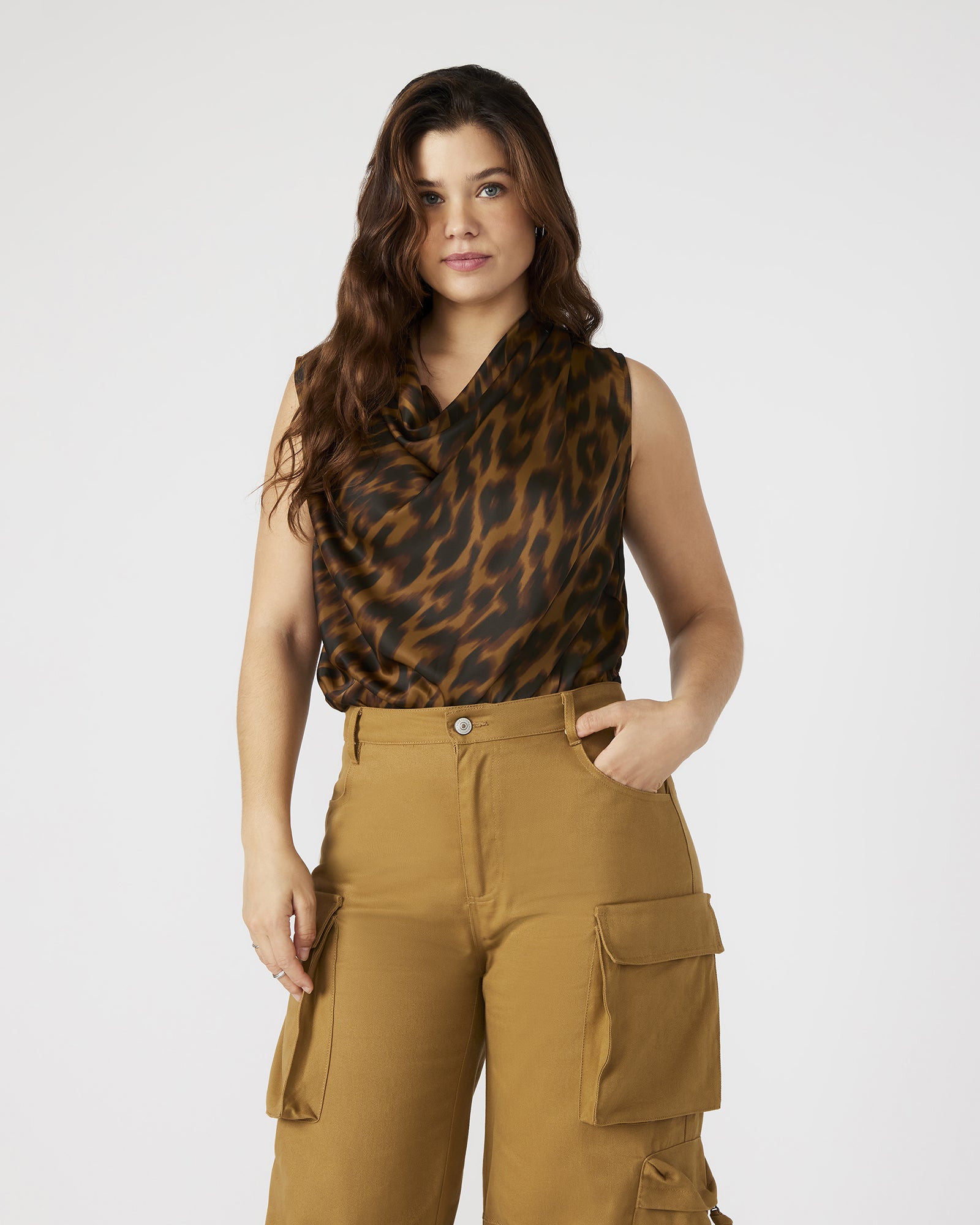Close-up of satin bodysuit fabric with leopard print detailing.